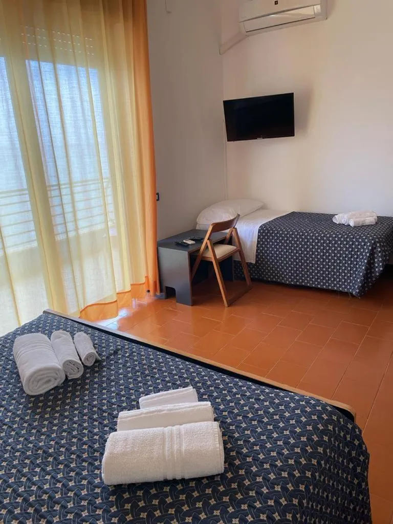 Bedroom in Capo Nettuno Hotel
