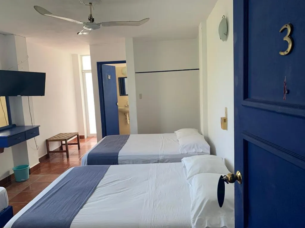 Photo of the whole room in MayFlower Hotel & Hostal