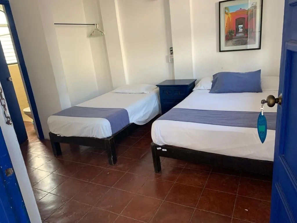 Bed in MayFlower Hotel & Hostal