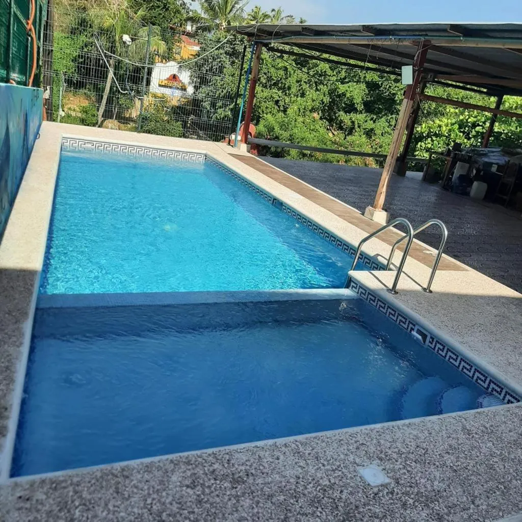 Pool view in MayFlower Hotel & Hostal
