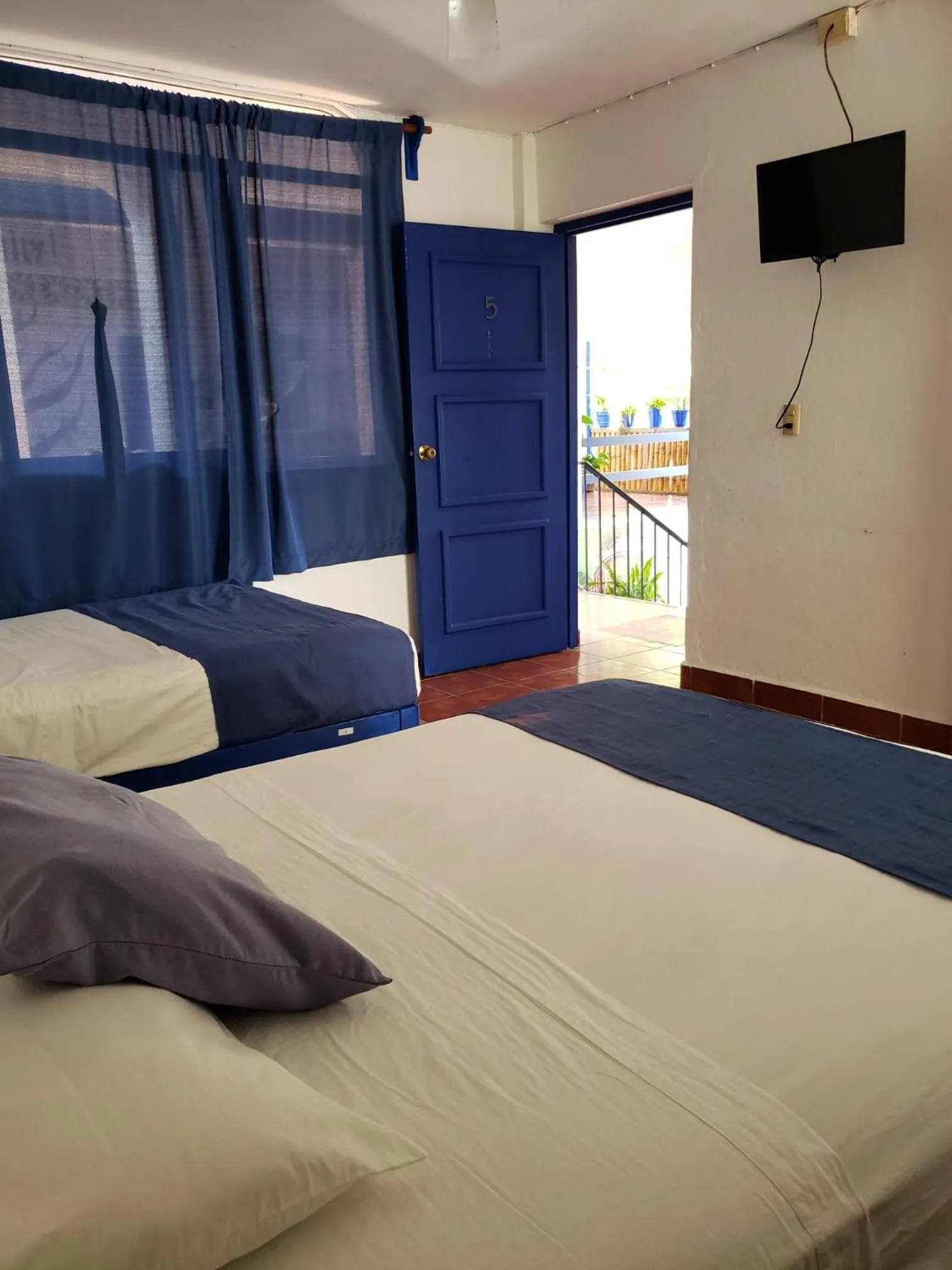 Bedroom in MayFlower Hotel & Hostal