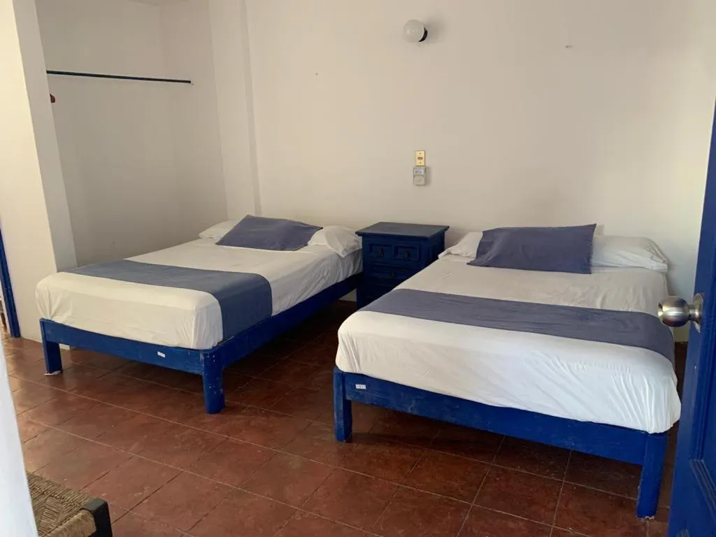 Bedroom in MayFlower Hotel & Hostal