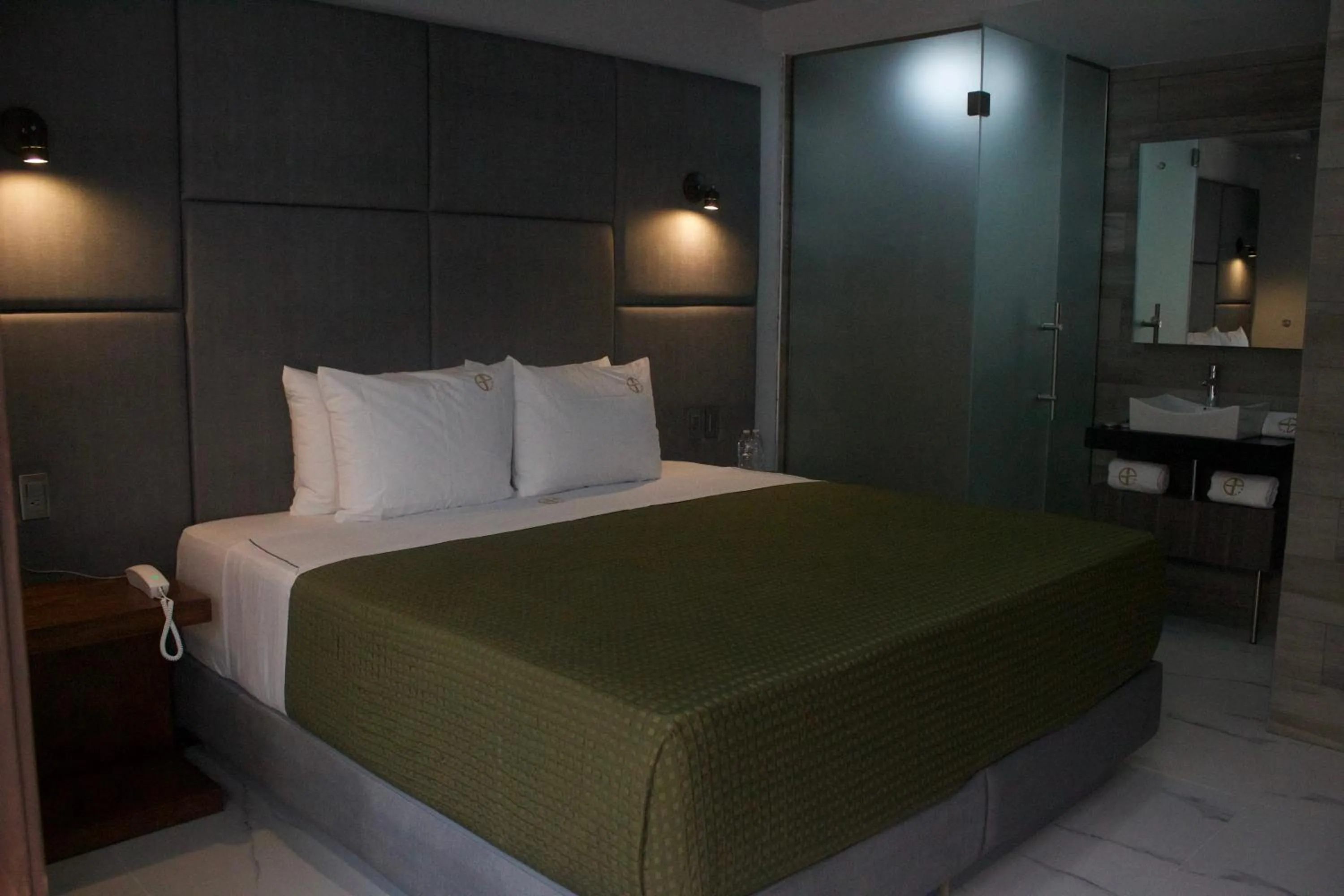 Bed in Hotel Grand One Plaza