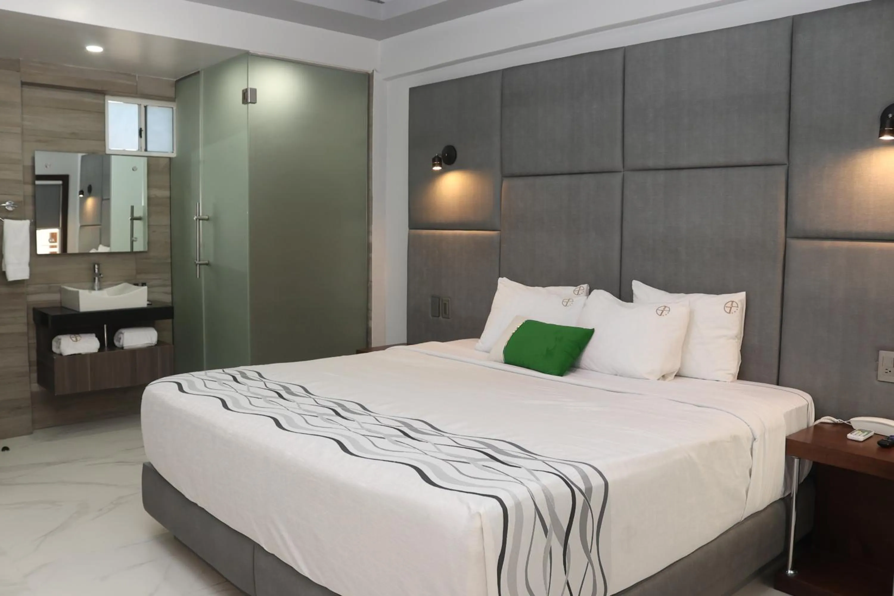 Bedroom, Bed in Hotel Grand One Plaza