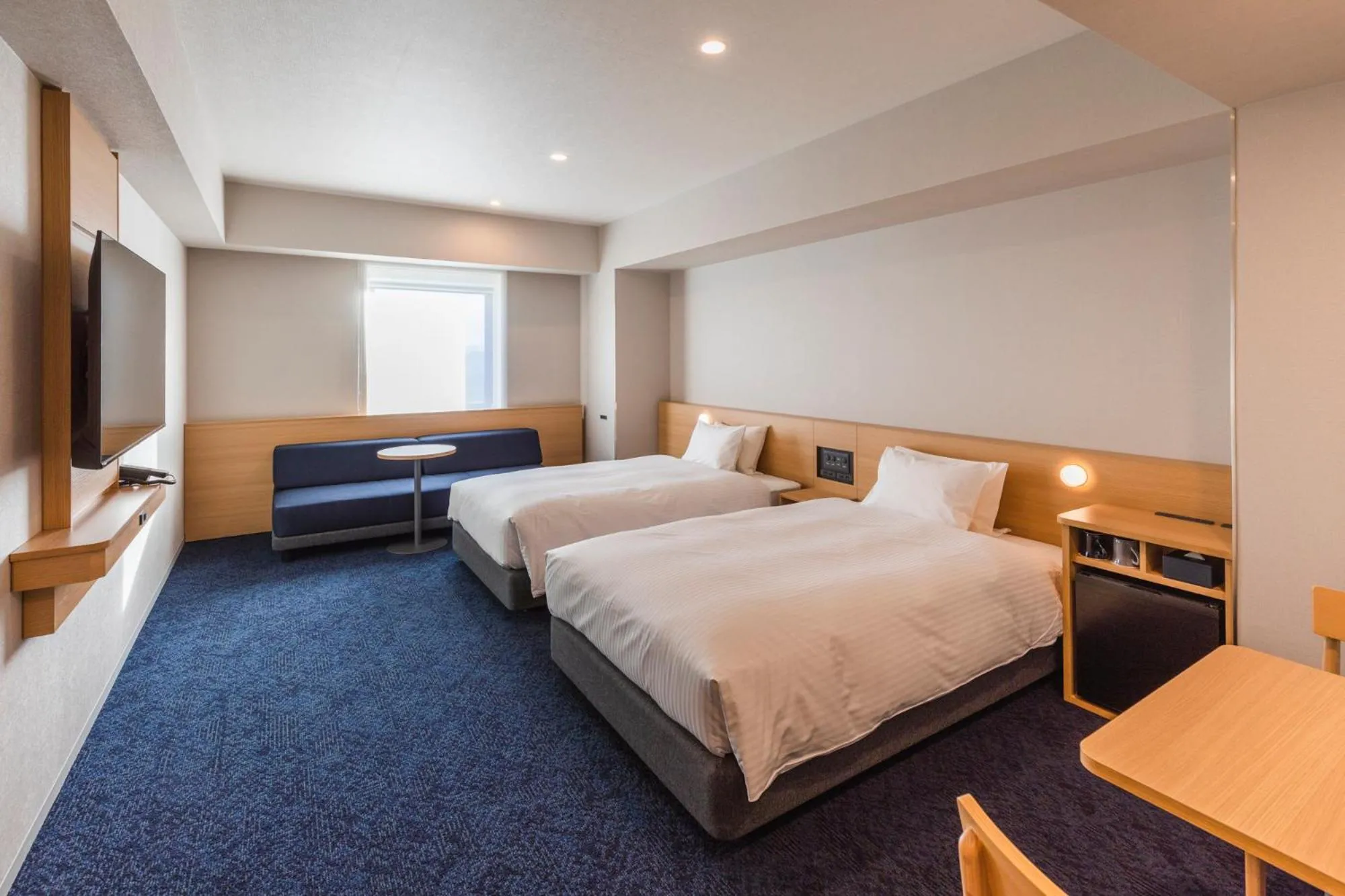 Photo of the whole room, Bed in Sotetsu Grand Fresa Kumamoto