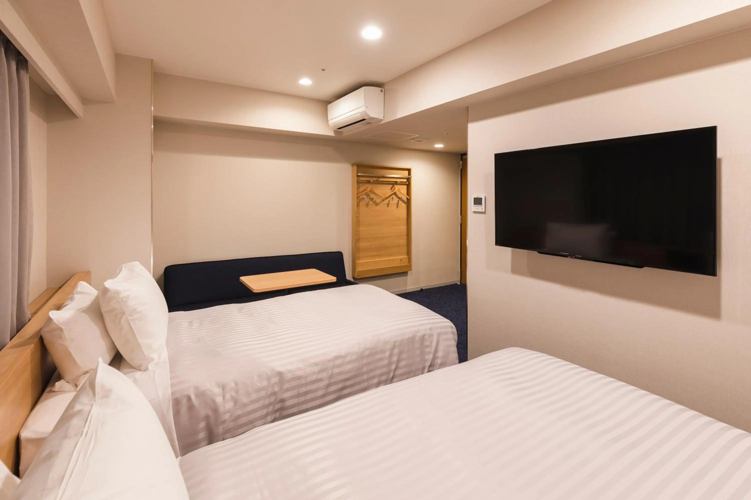 Bed in Sotetsu Grand Fresa Kumamoto