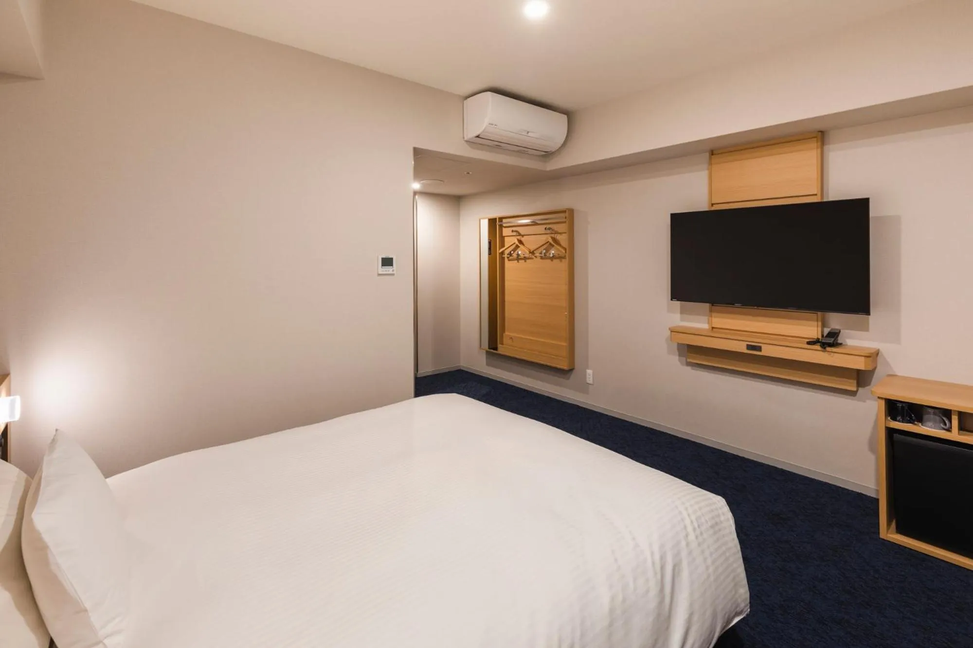 Bed in Sotetsu Grand Fresa Kumamoto