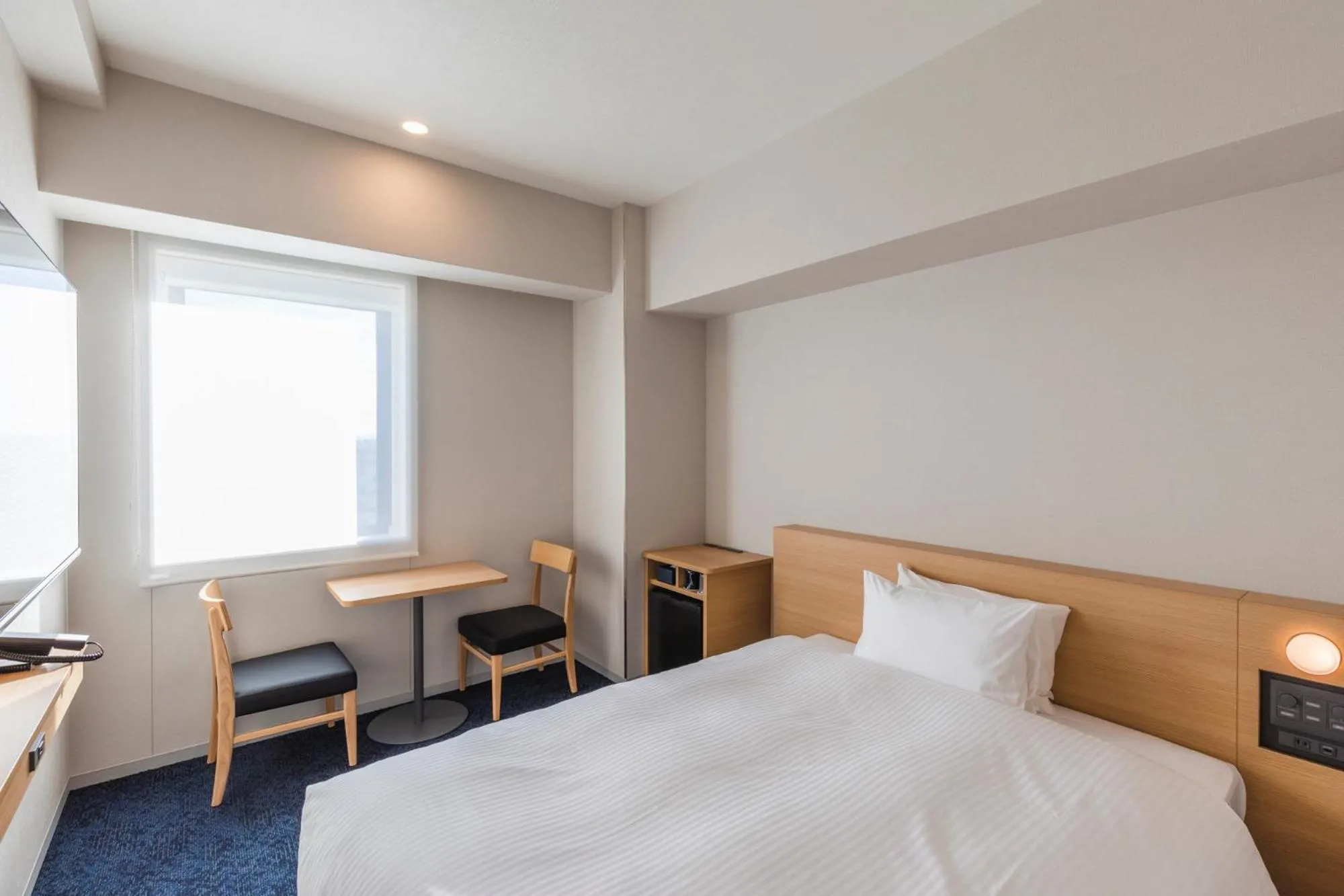 Photo of the whole room, Bed in Sotetsu Grand Fresa Kumamoto