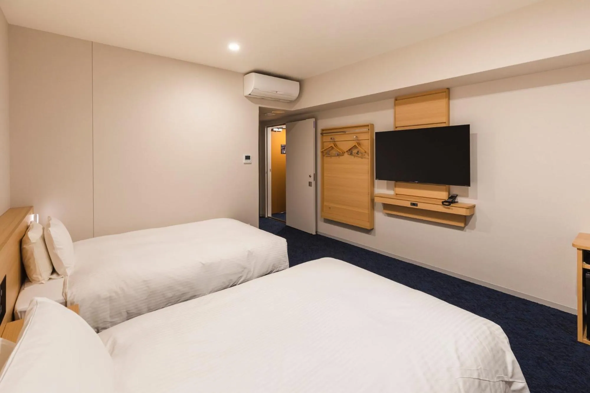 Bed in Sotetsu Grand Fresa Kumamoto