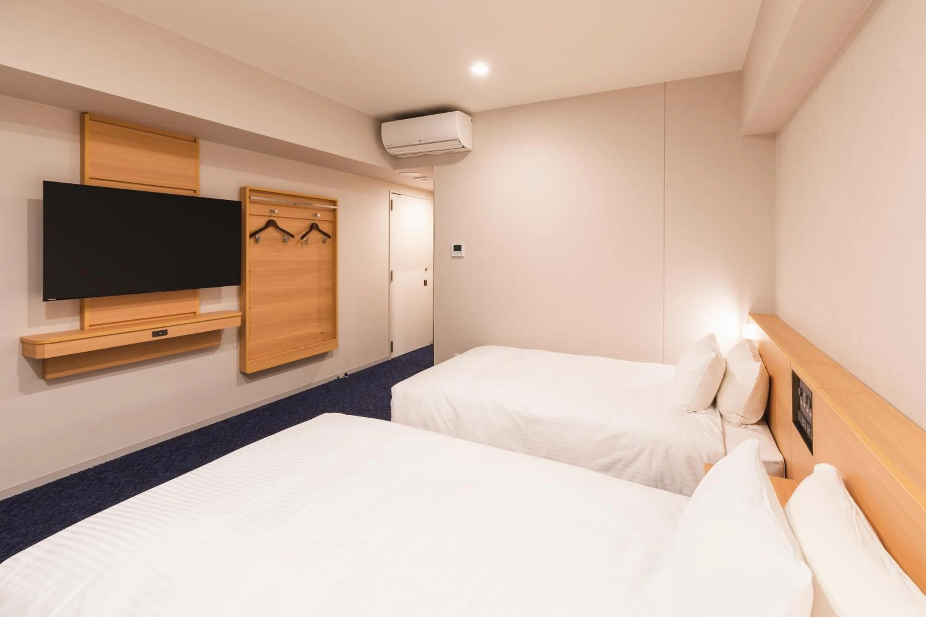 Bed in Sotetsu Grand Fresa Kumamoto