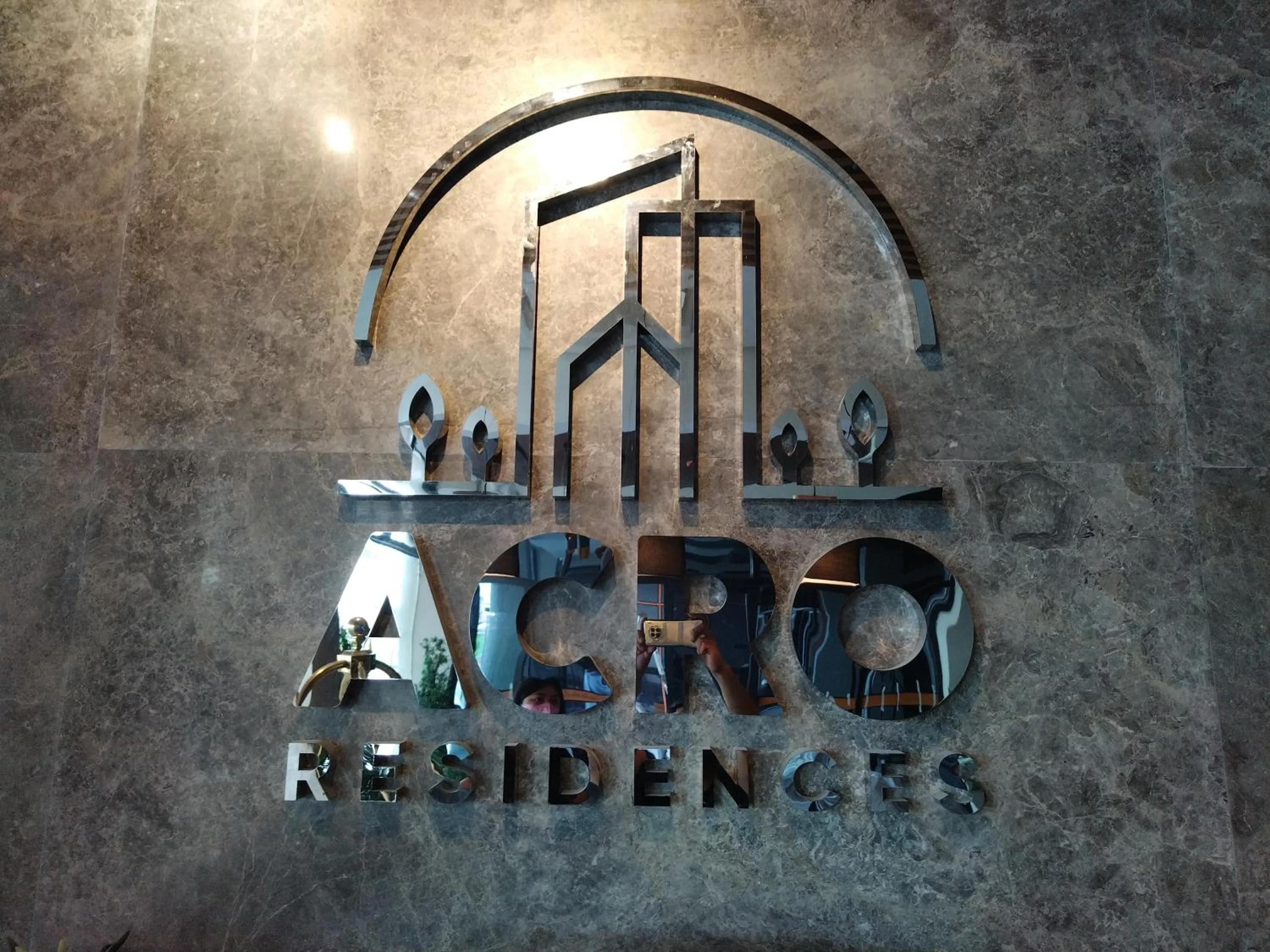 Property logo or sign in Acro Residences