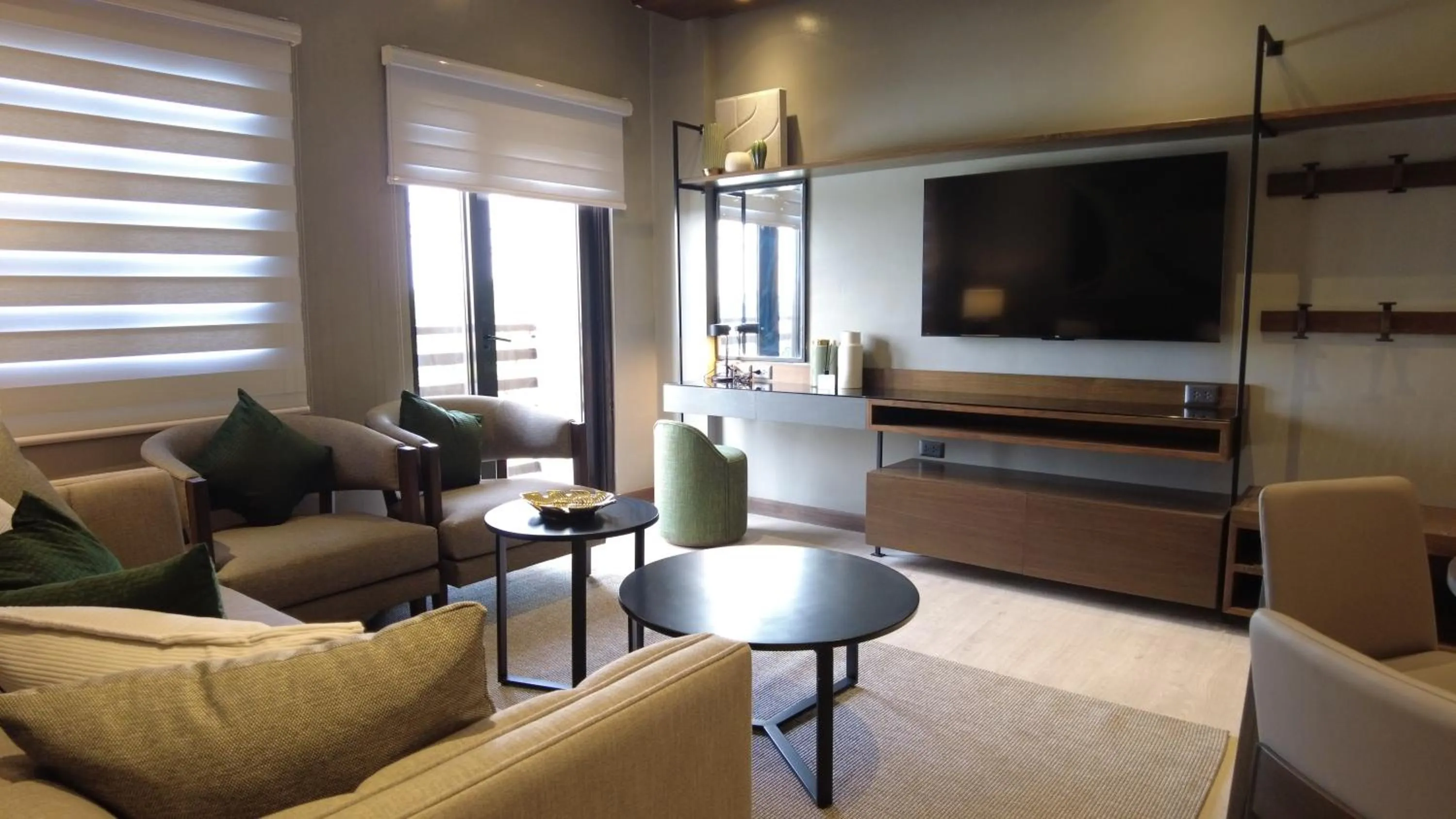 Communal lounge/ TV room in Acro Residences