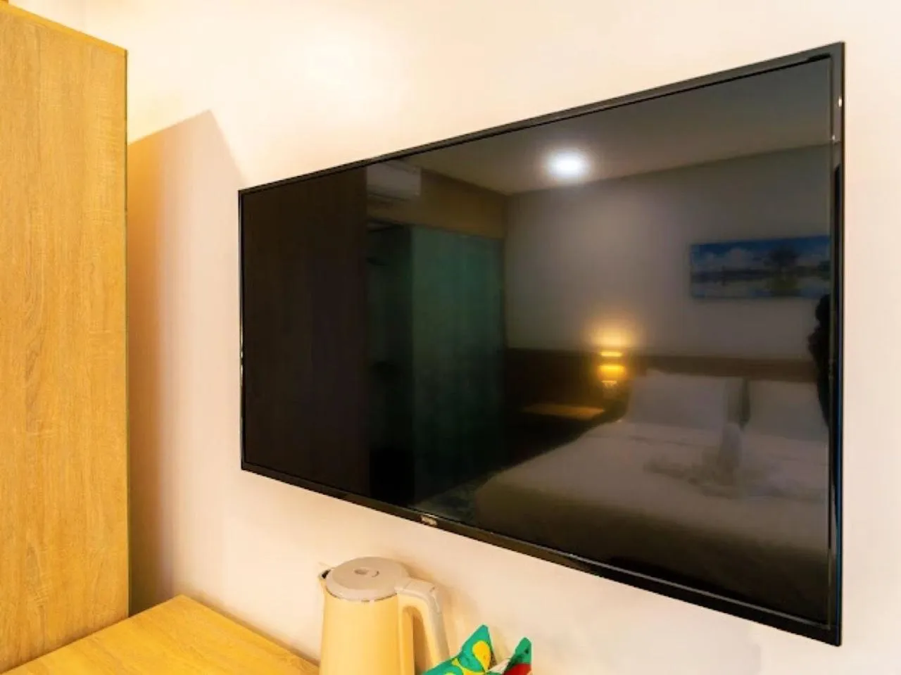 Bed in New Champa Boutique Hotel