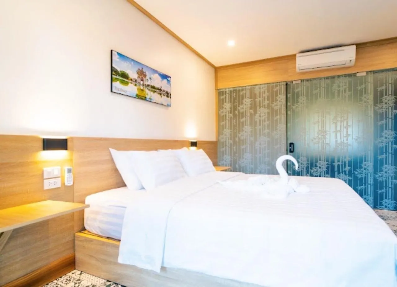 Bed in New Champa Boutique Hotel