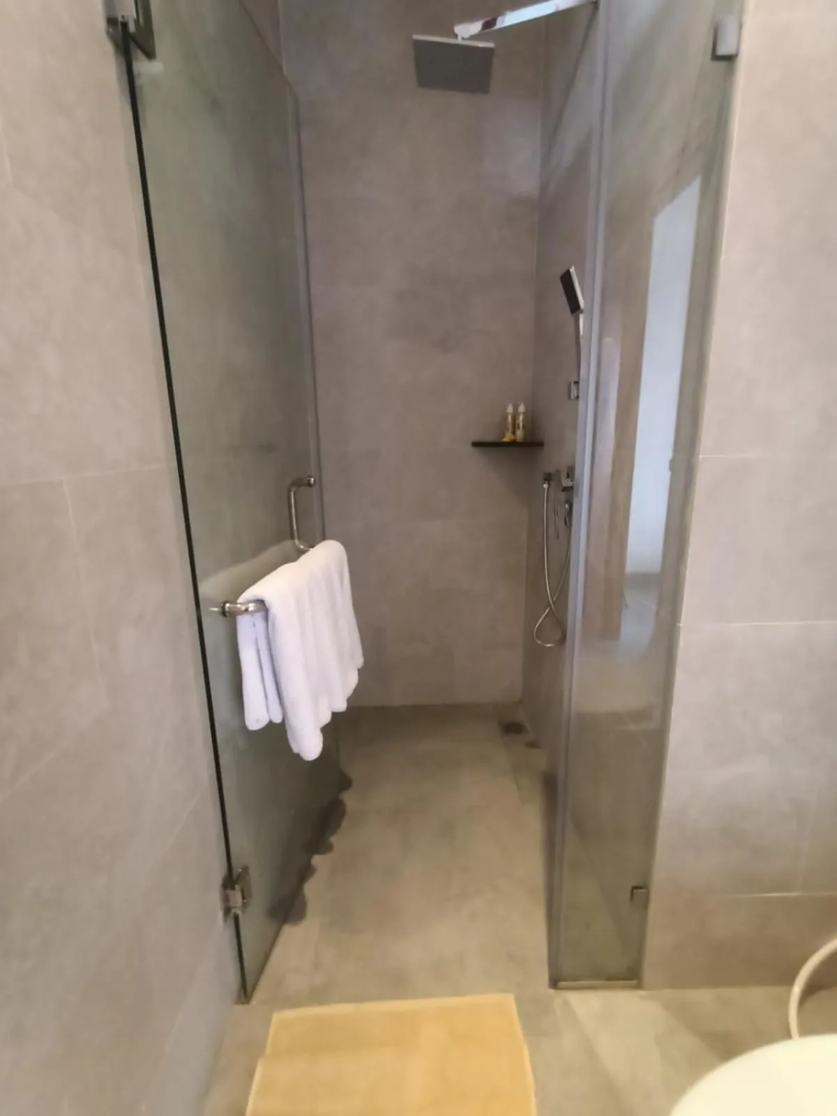 Shower in The Kd Suites & Coffee Shop