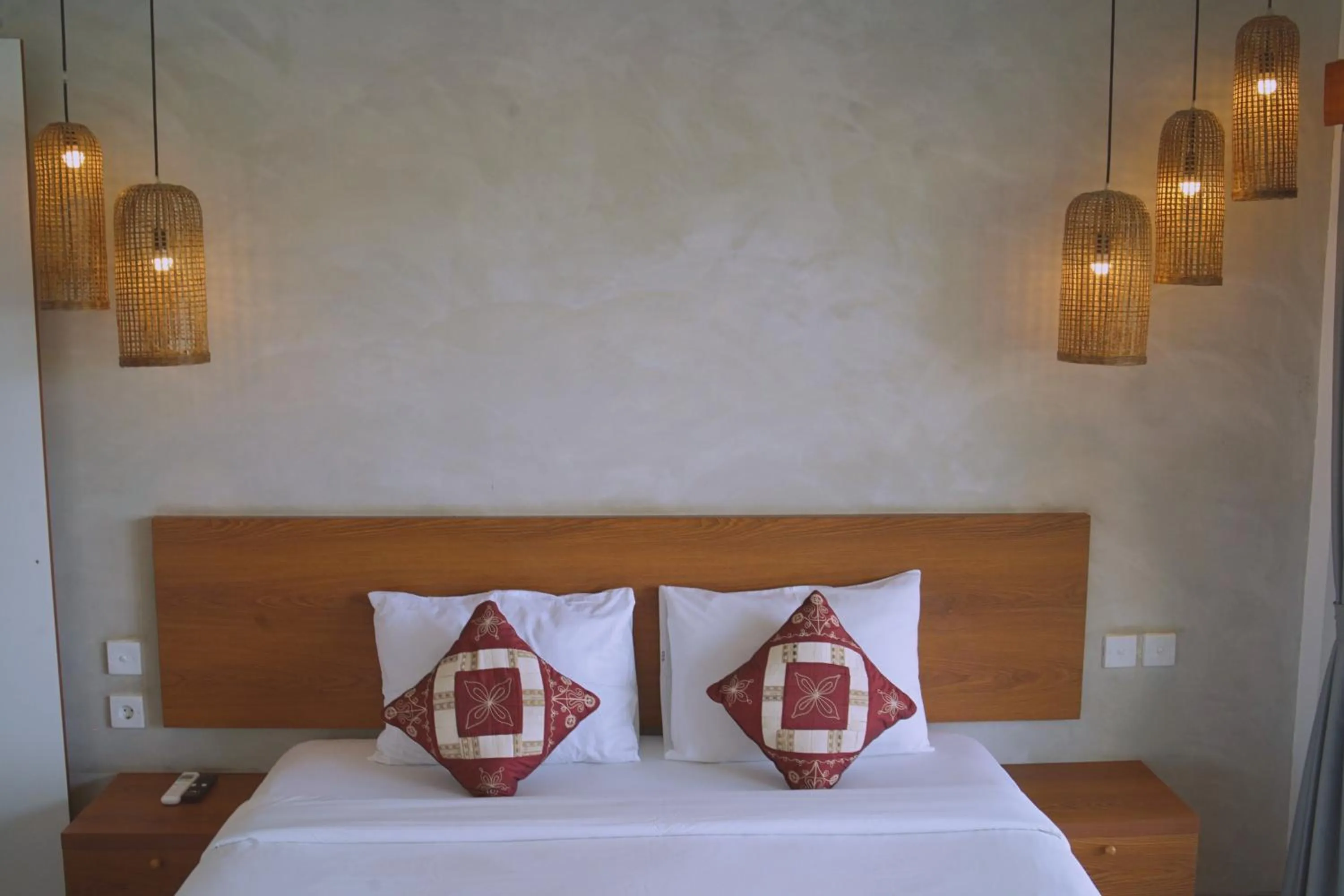 Bed in The Kd Suites & Coffee Shop