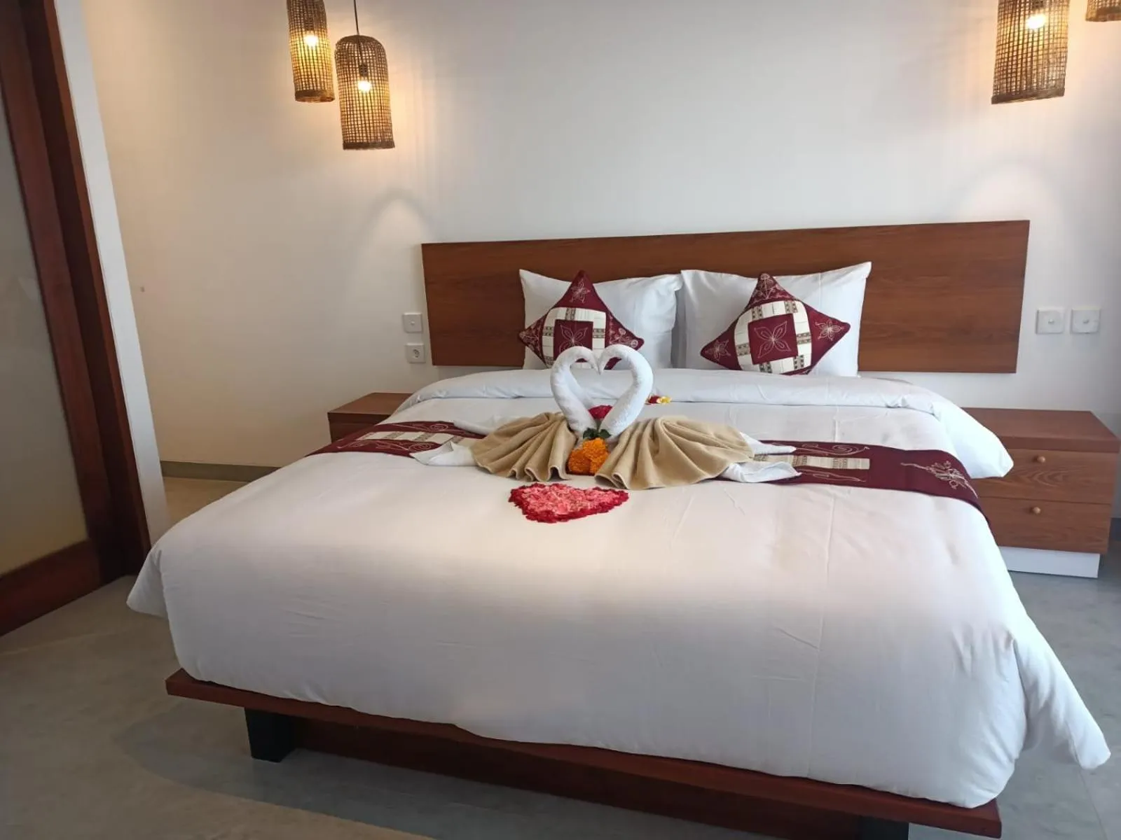 Bed in The Kd Suites & Coffee Shop