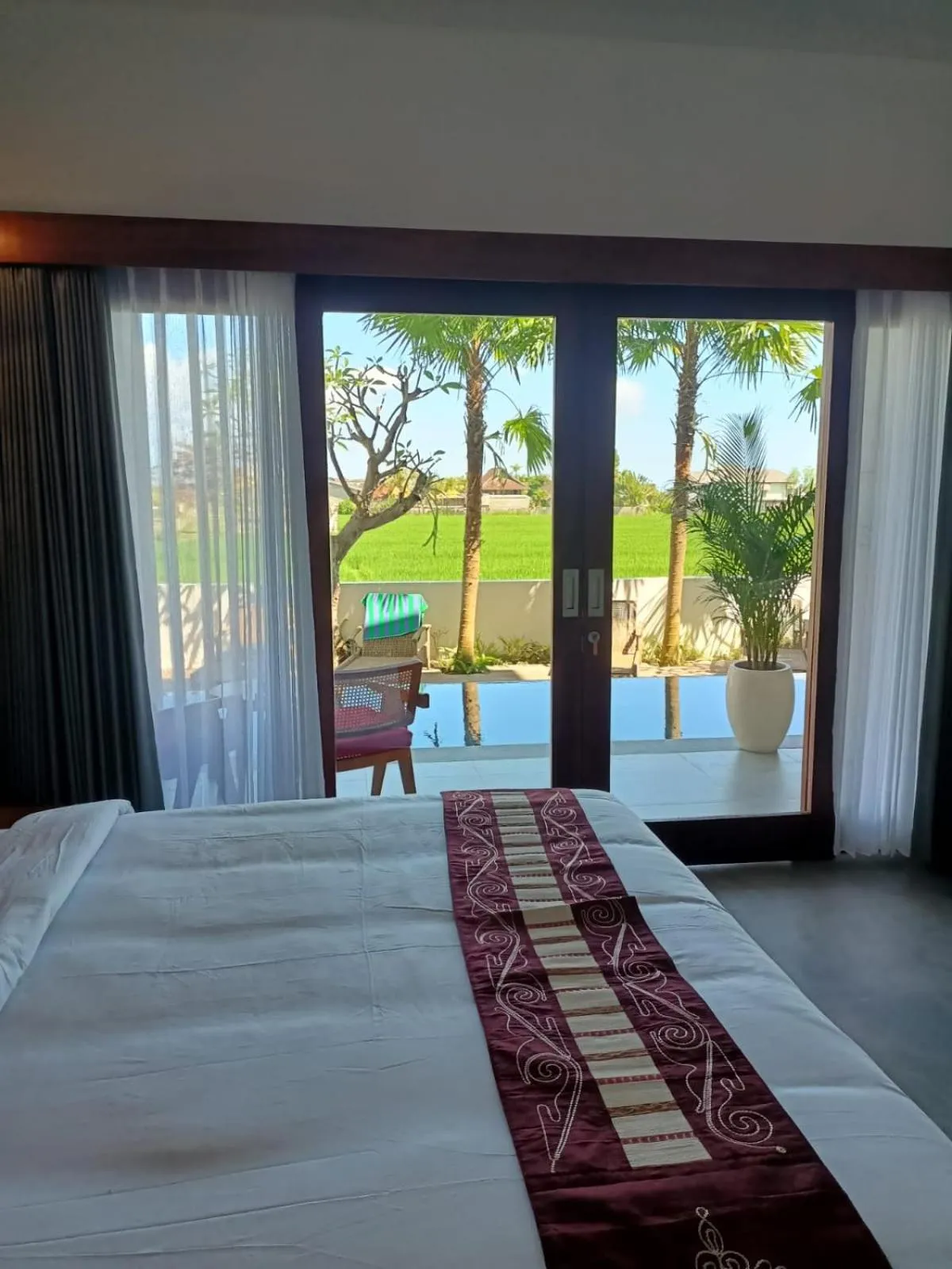 Pool view, Bed in The Kd Suites & Coffee Shop