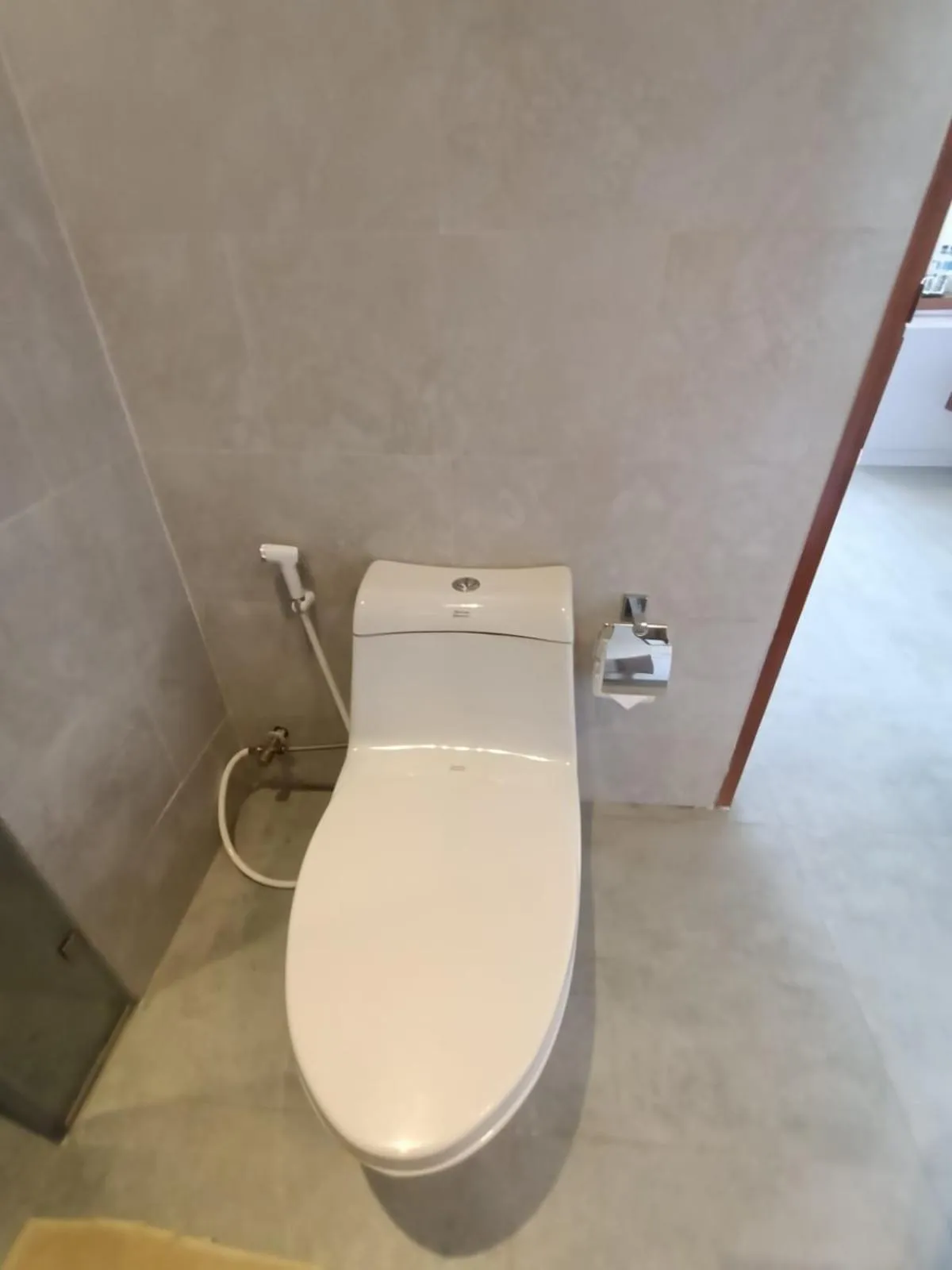 Toilet in The Kd Suites & Coffee Shop