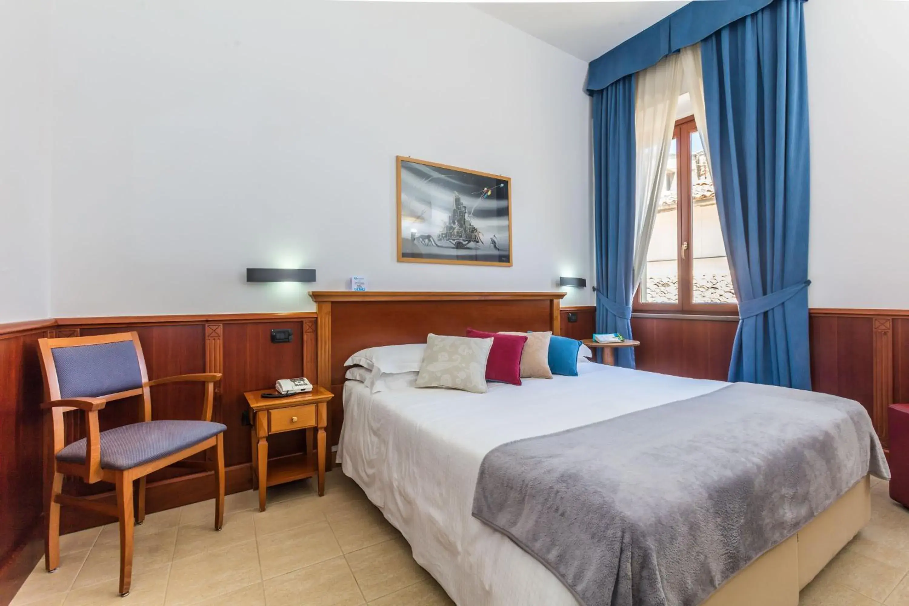 Triple Room in Hotel Duomo Triple Room in Hotel Duomo