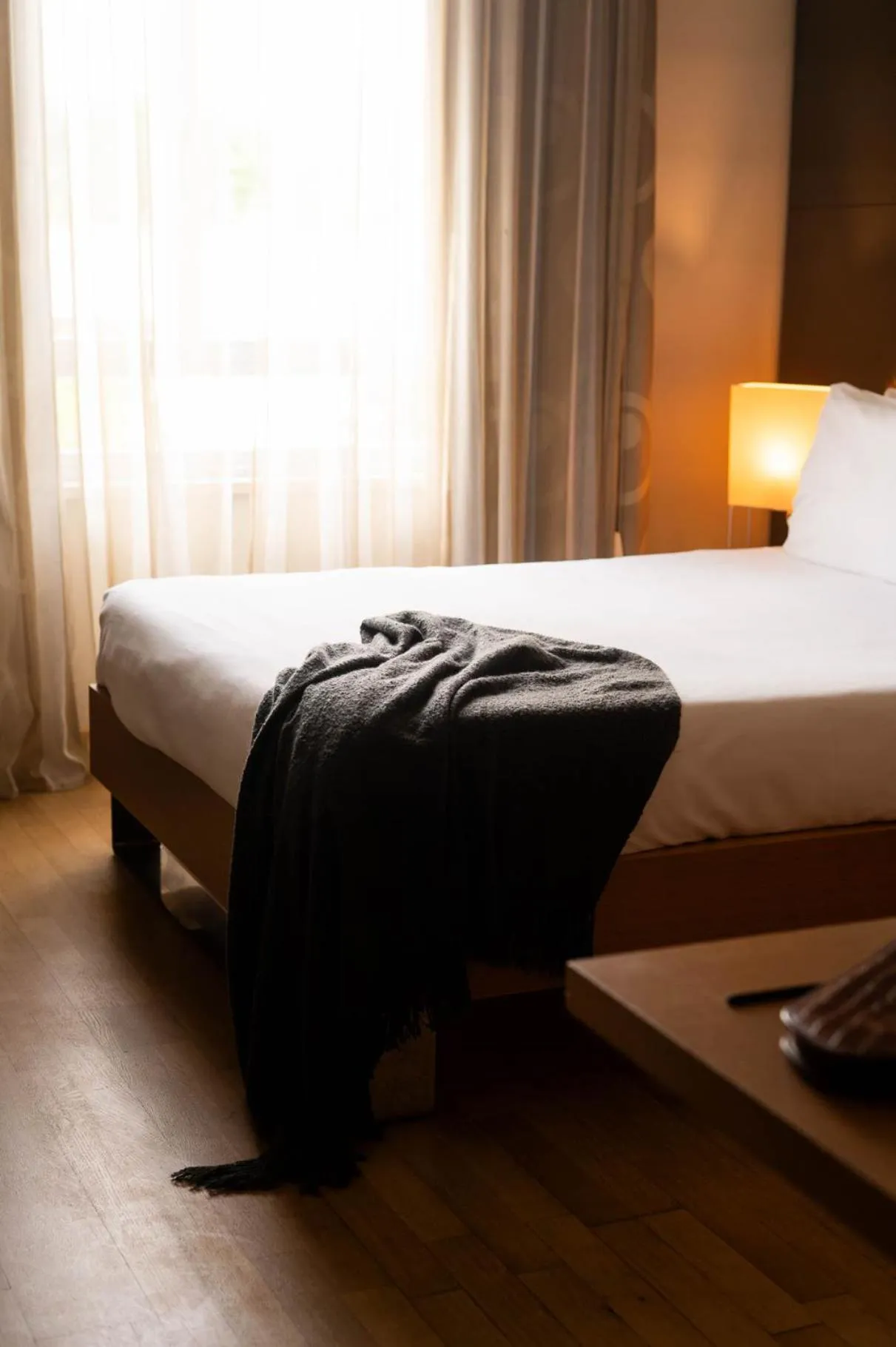 Bed in Axolute Comfort Hotel Como Cantù