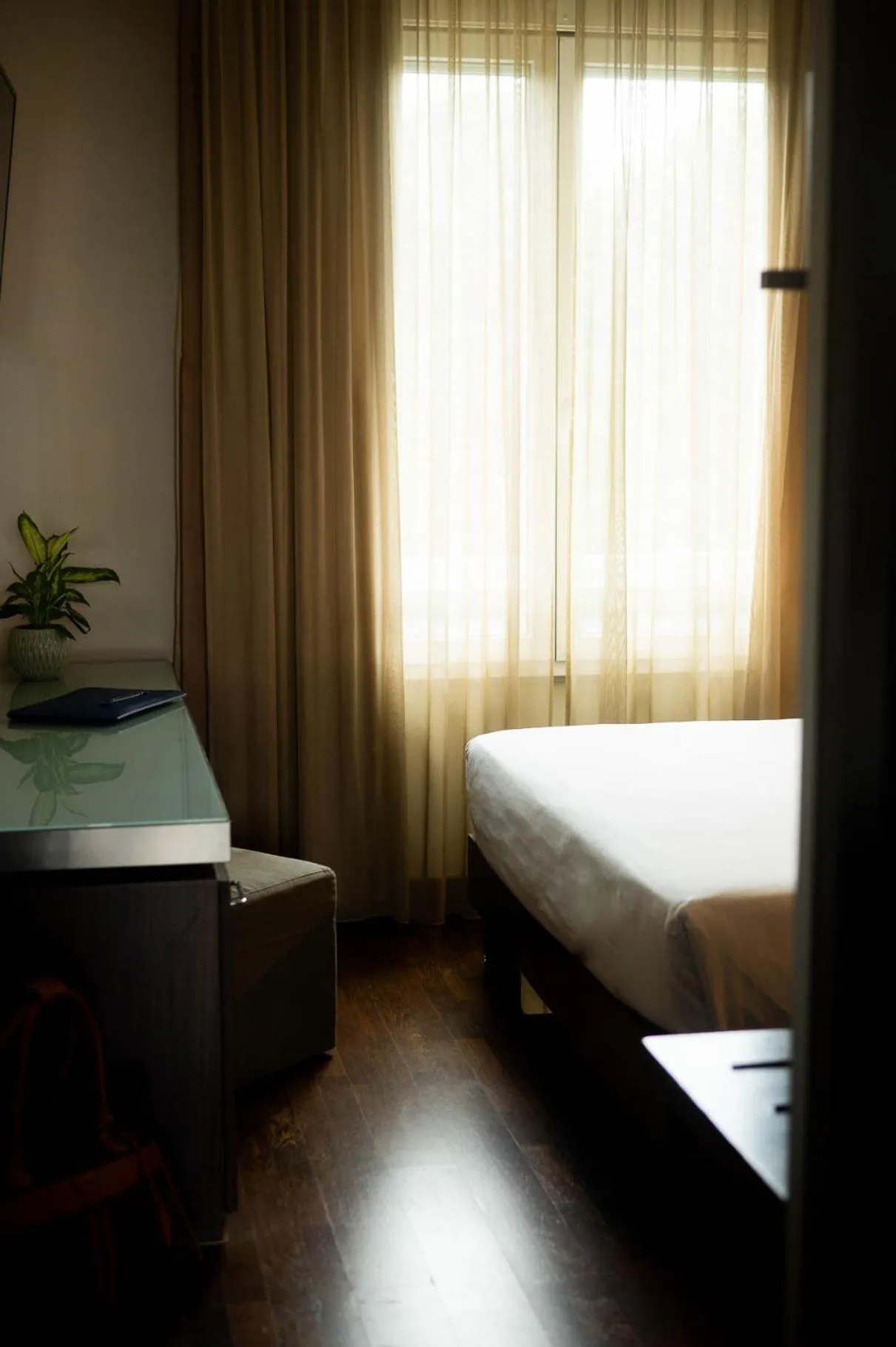 Bed in Axolute Comfort Hotel Como Cantù