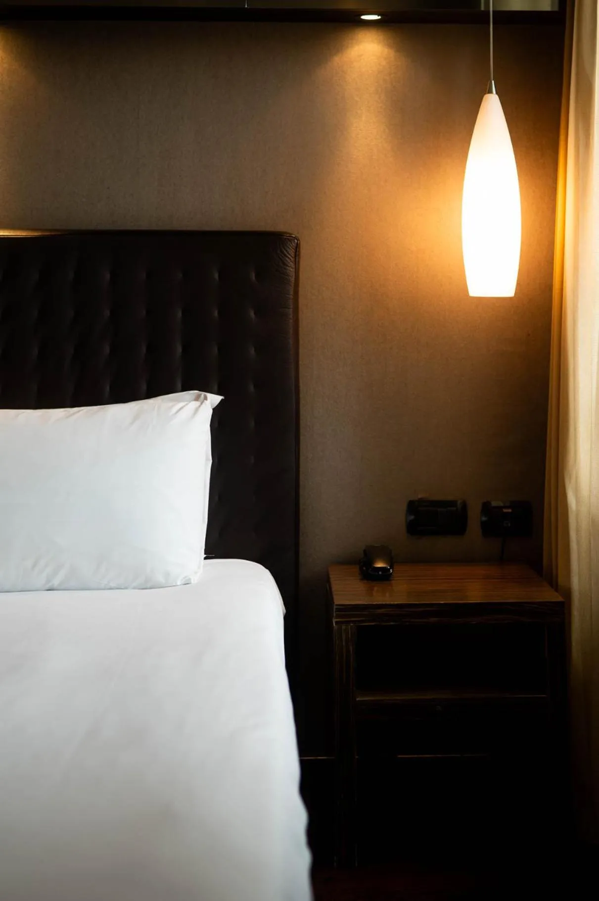 Bed in Axolute Comfort Hotel Como Cantù