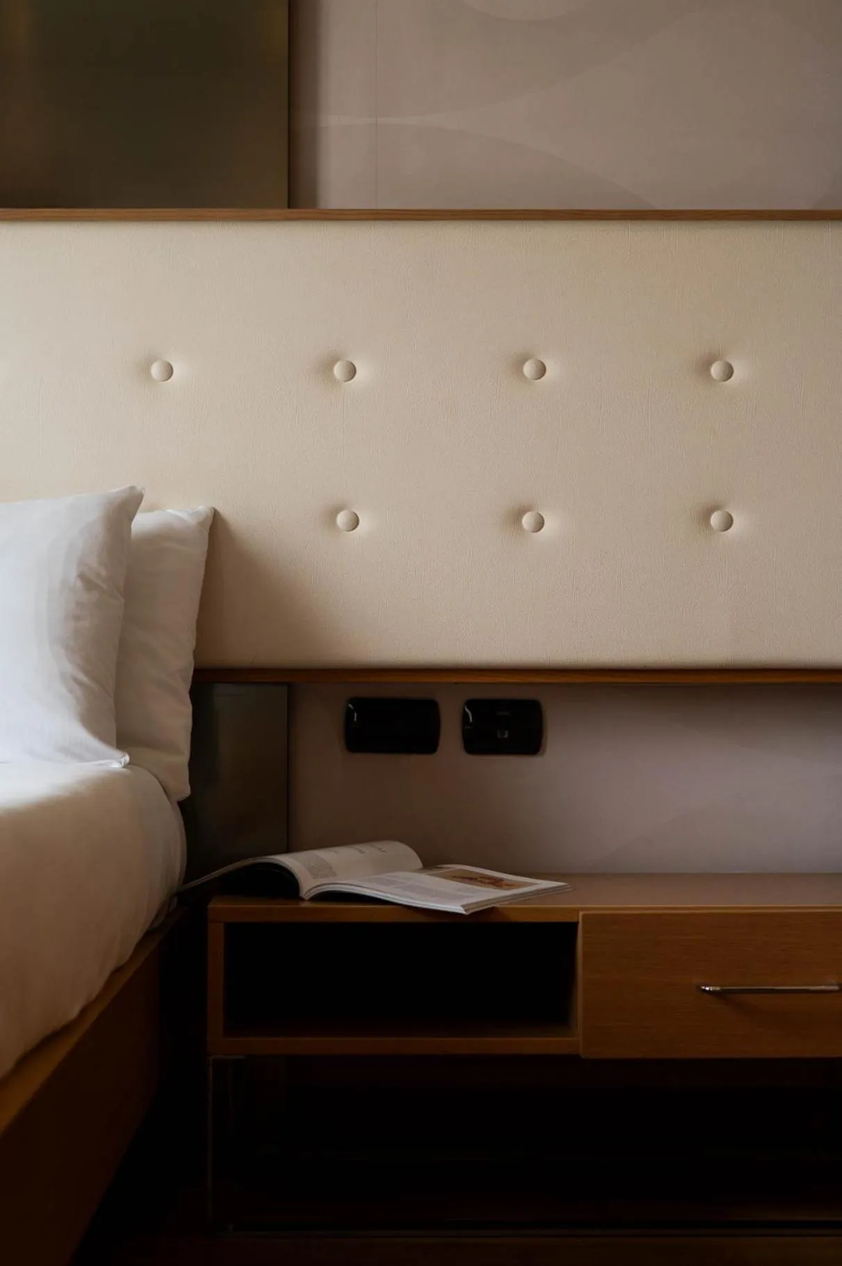 Bed in Axolute Comfort Hotel Como Cantù