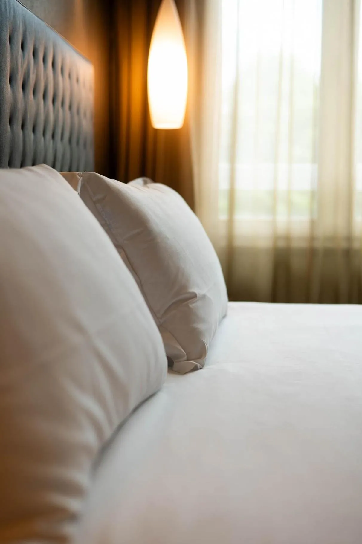 Bed in Axolute Comfort Hotel Como Cantù