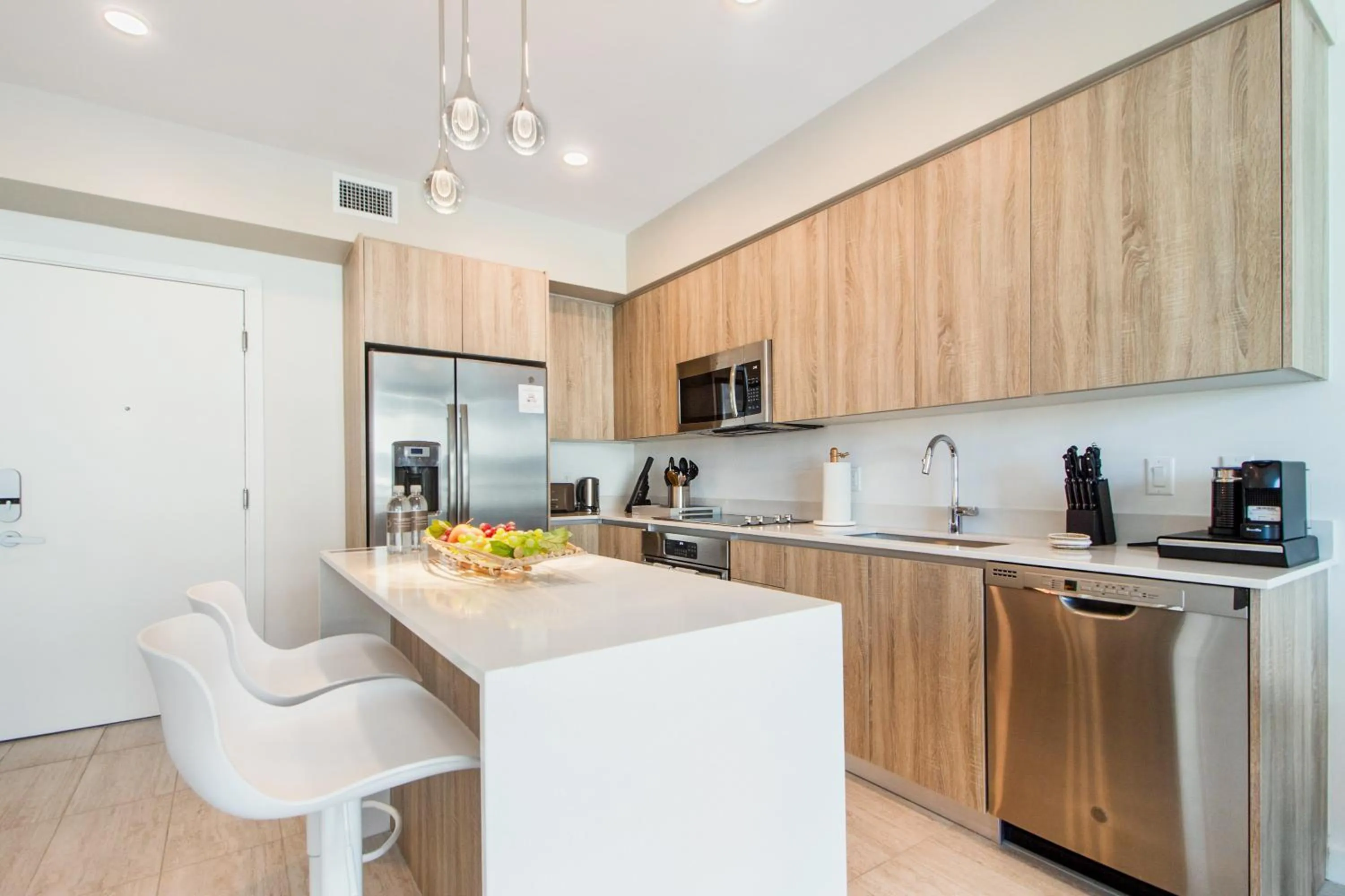 Kitchen or kitchenette in Nomada Destination Residences - Quadro
