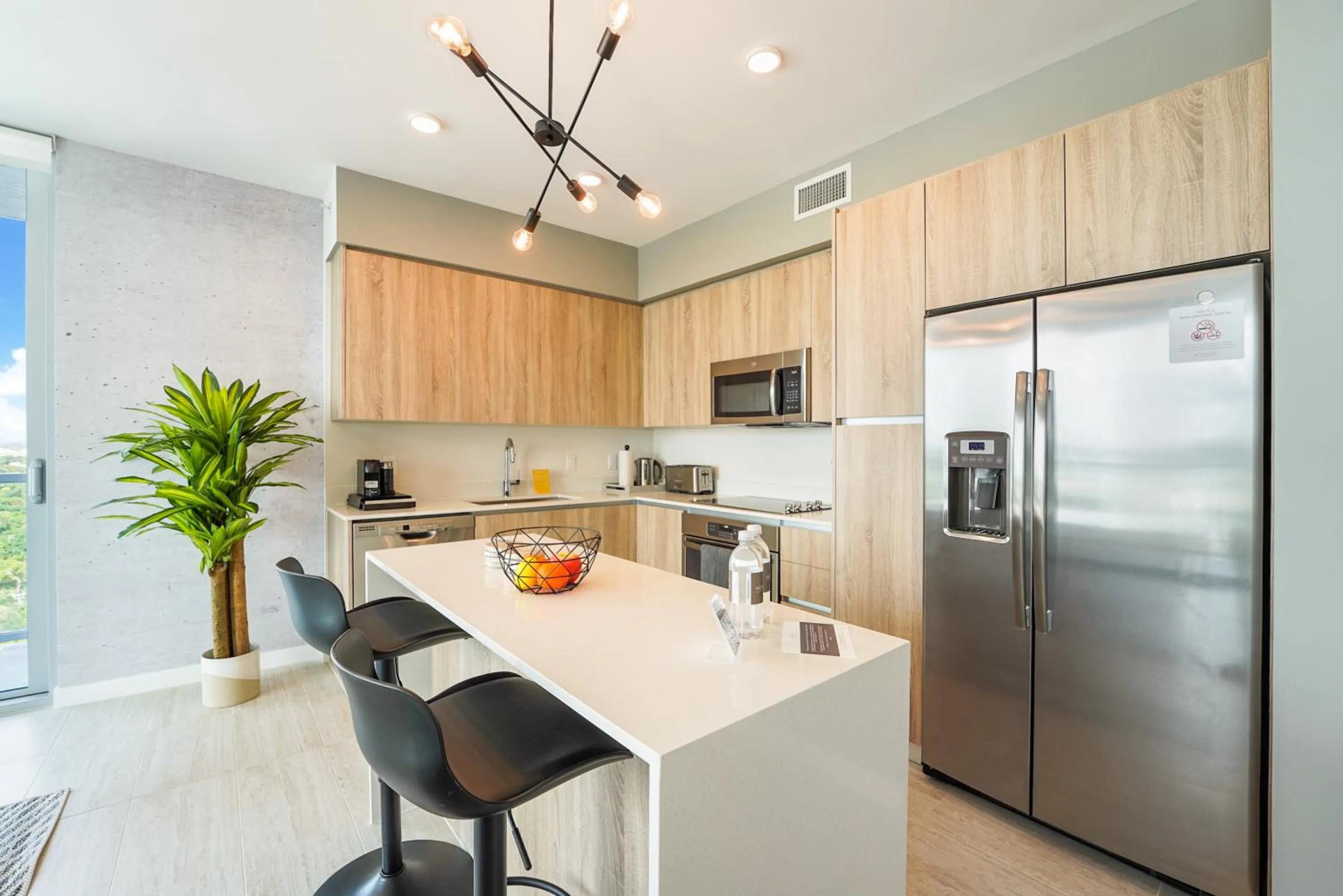 Kitchen or kitchenette in Nomada Destination Residences - Quadro