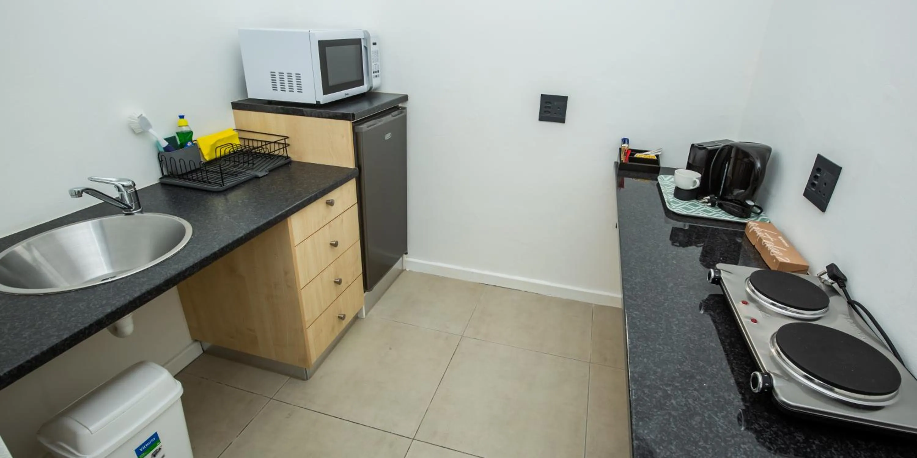 Kitchen or kitchenette in Casa iLanga guesthouse