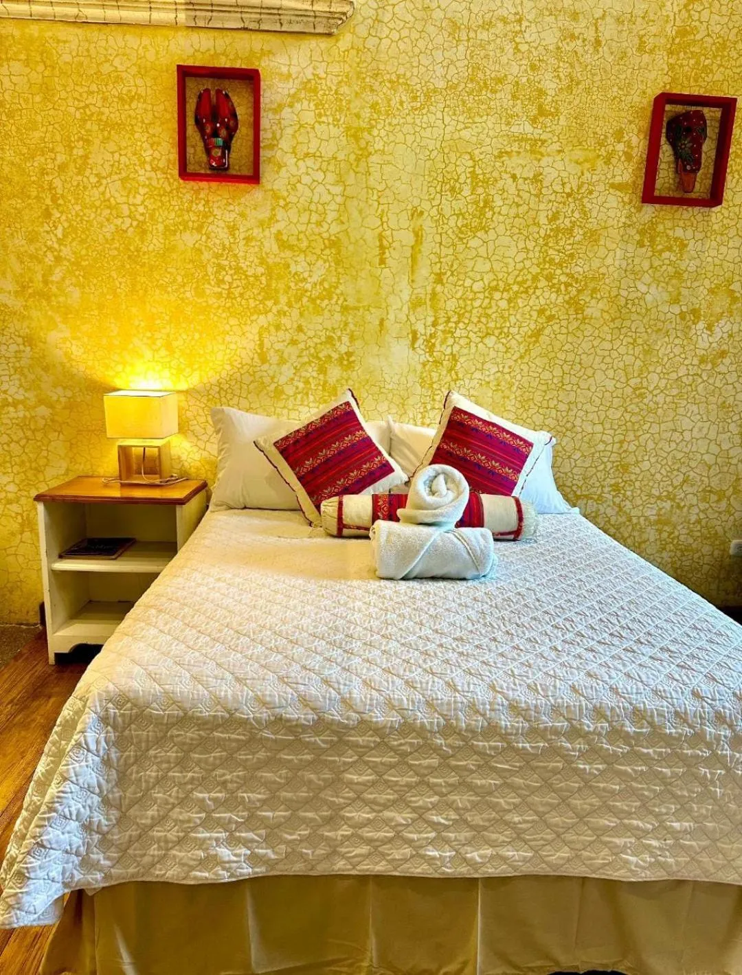 Bed in Casa Mia Hotel