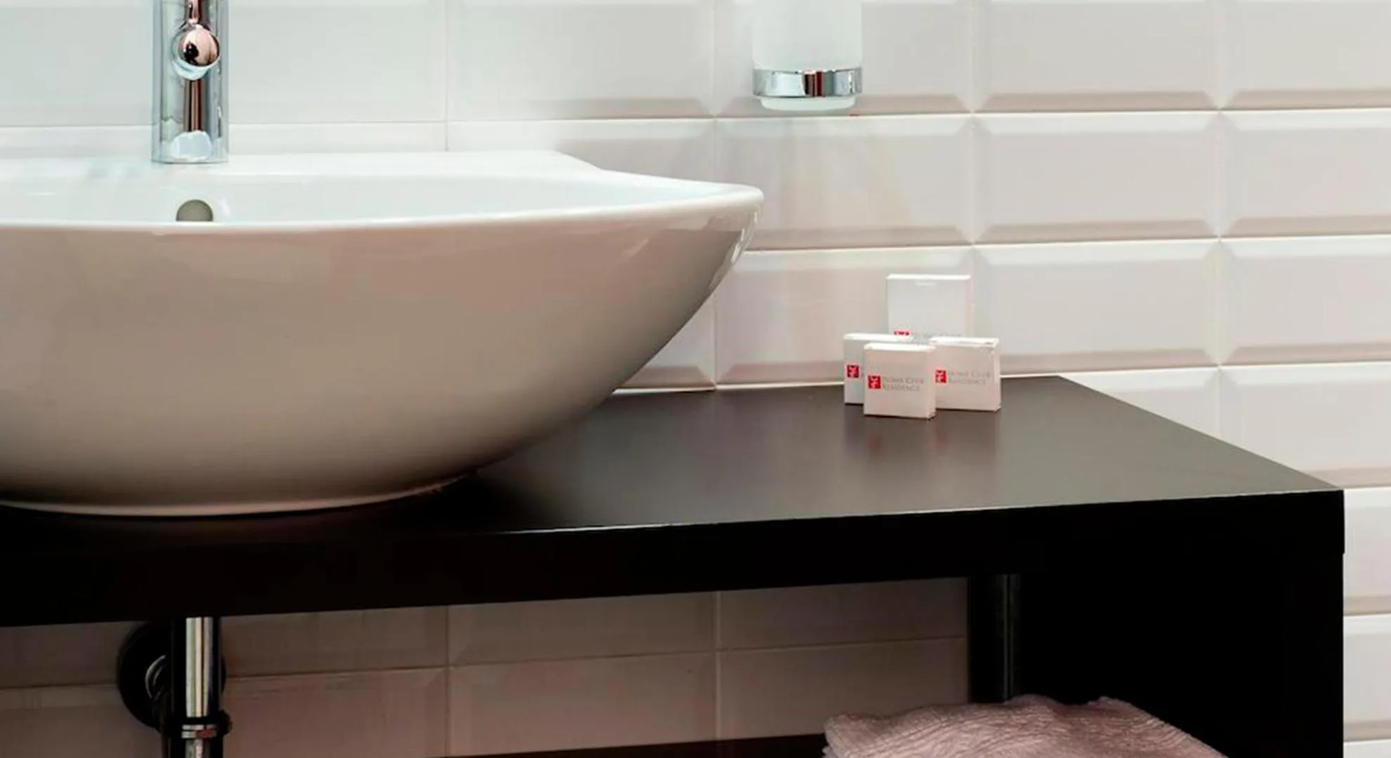 Bathroom in Home Club Suite Hotel