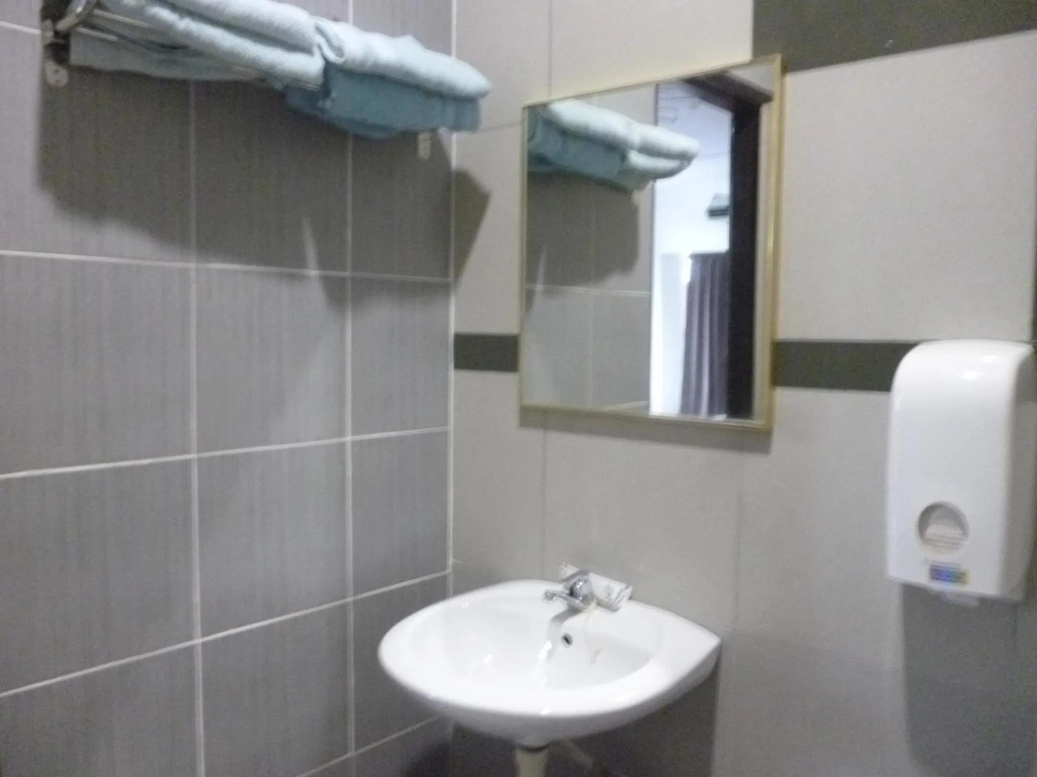 Bathroom in G Six Hotel