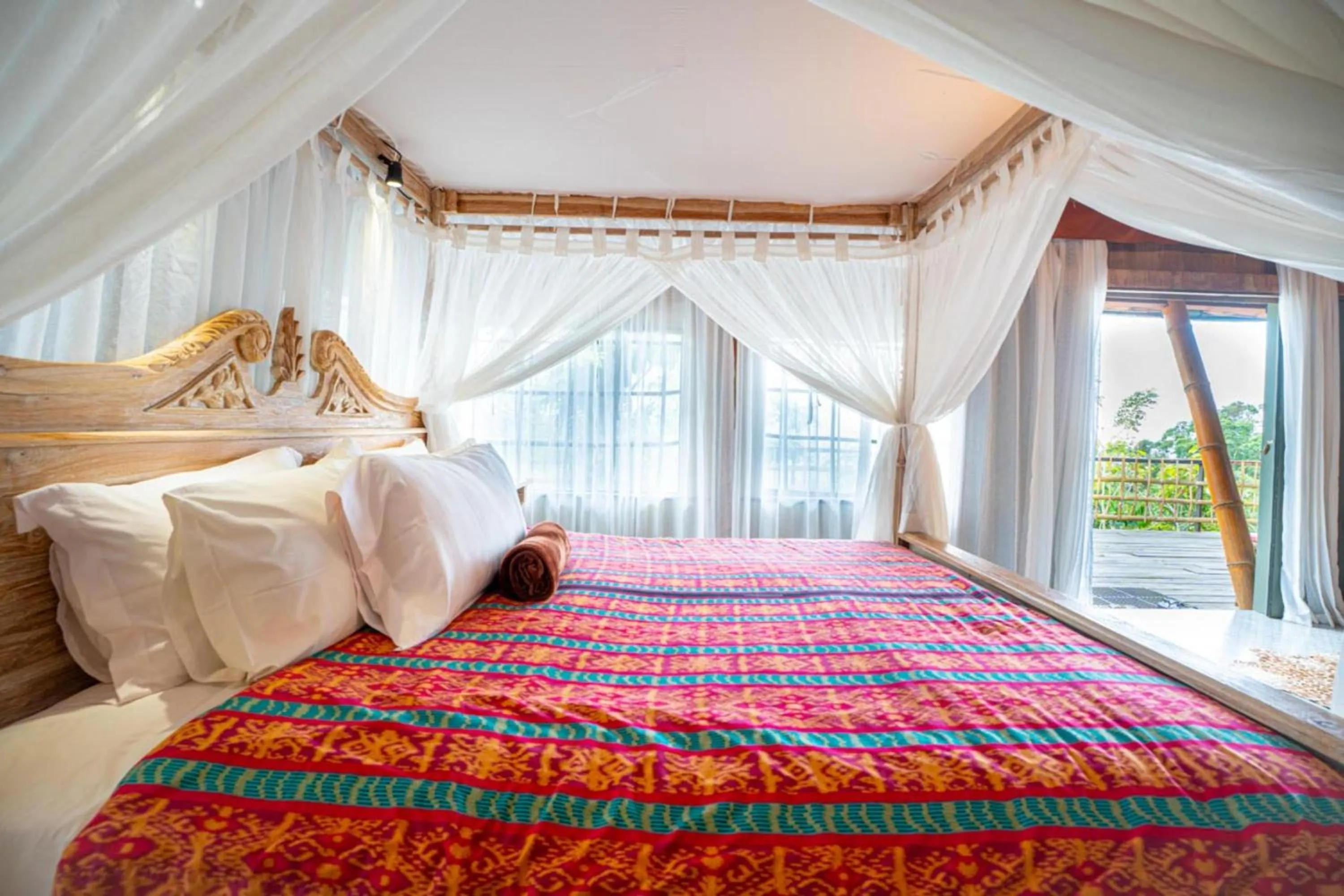 Bed in Sang Giri Mountain Tent Resort