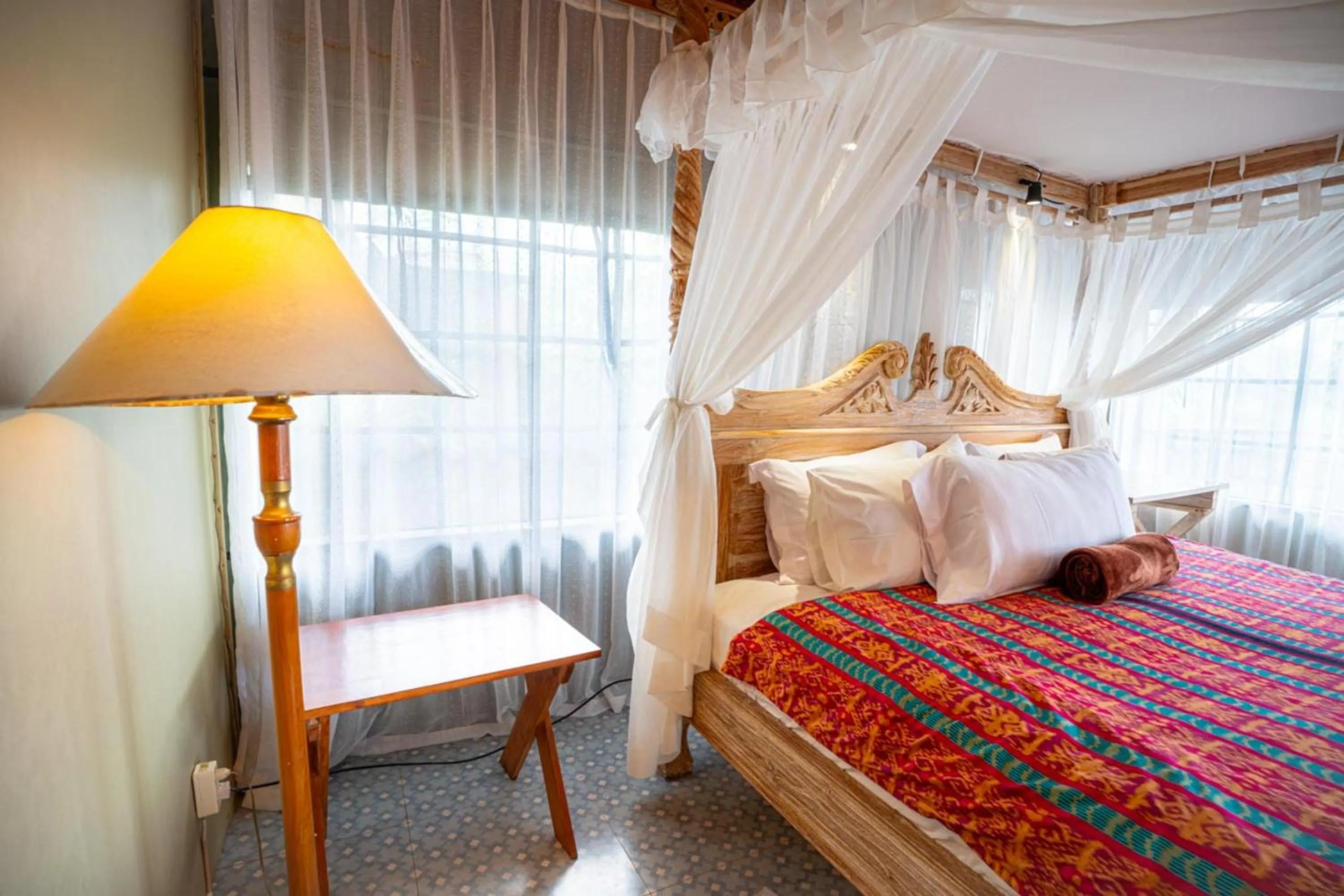 Bed in Sang Giri Mountain Tent Resort