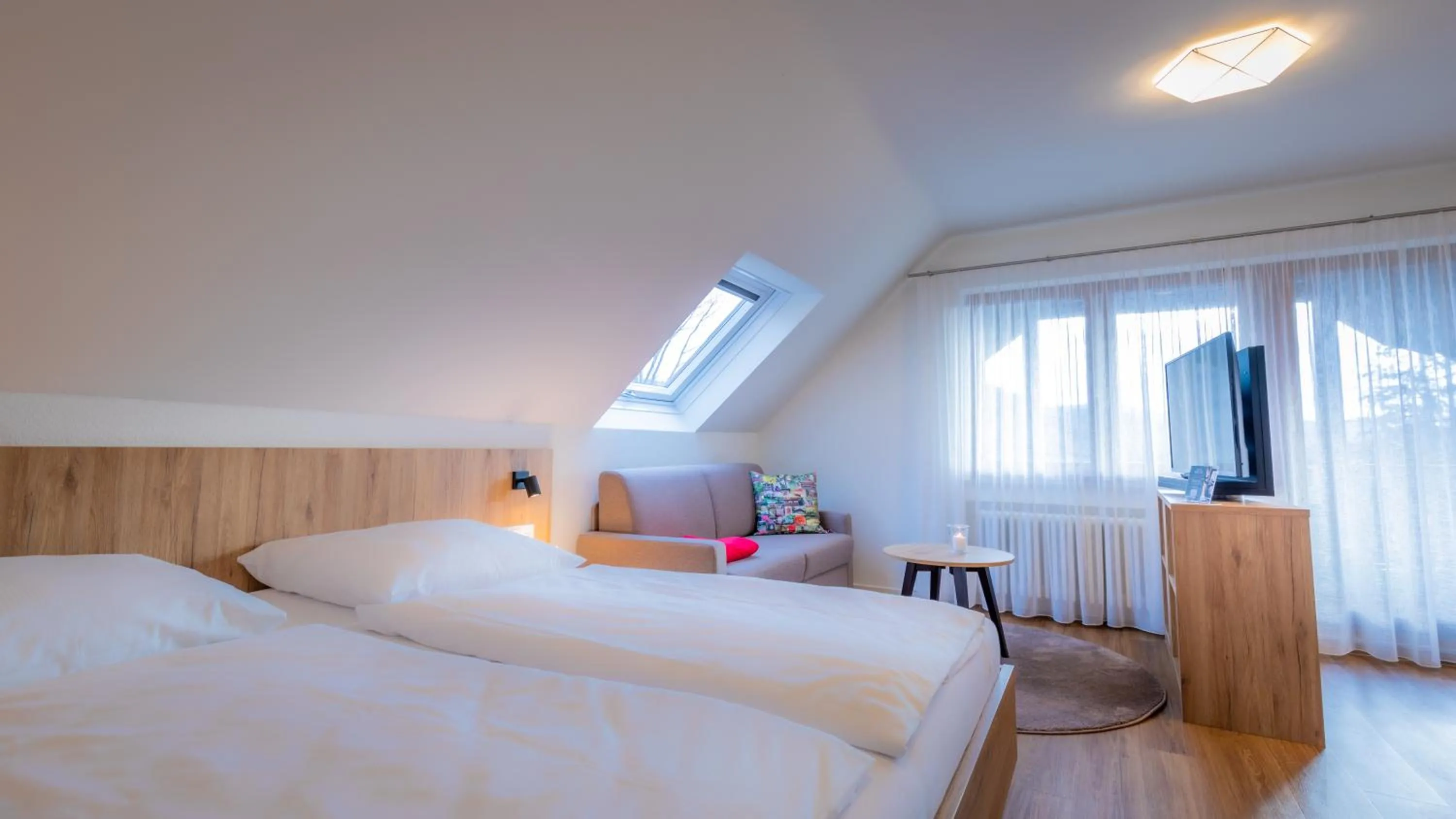 Bed in Gasthaus Hirschenstube & Gästehaus Gehri