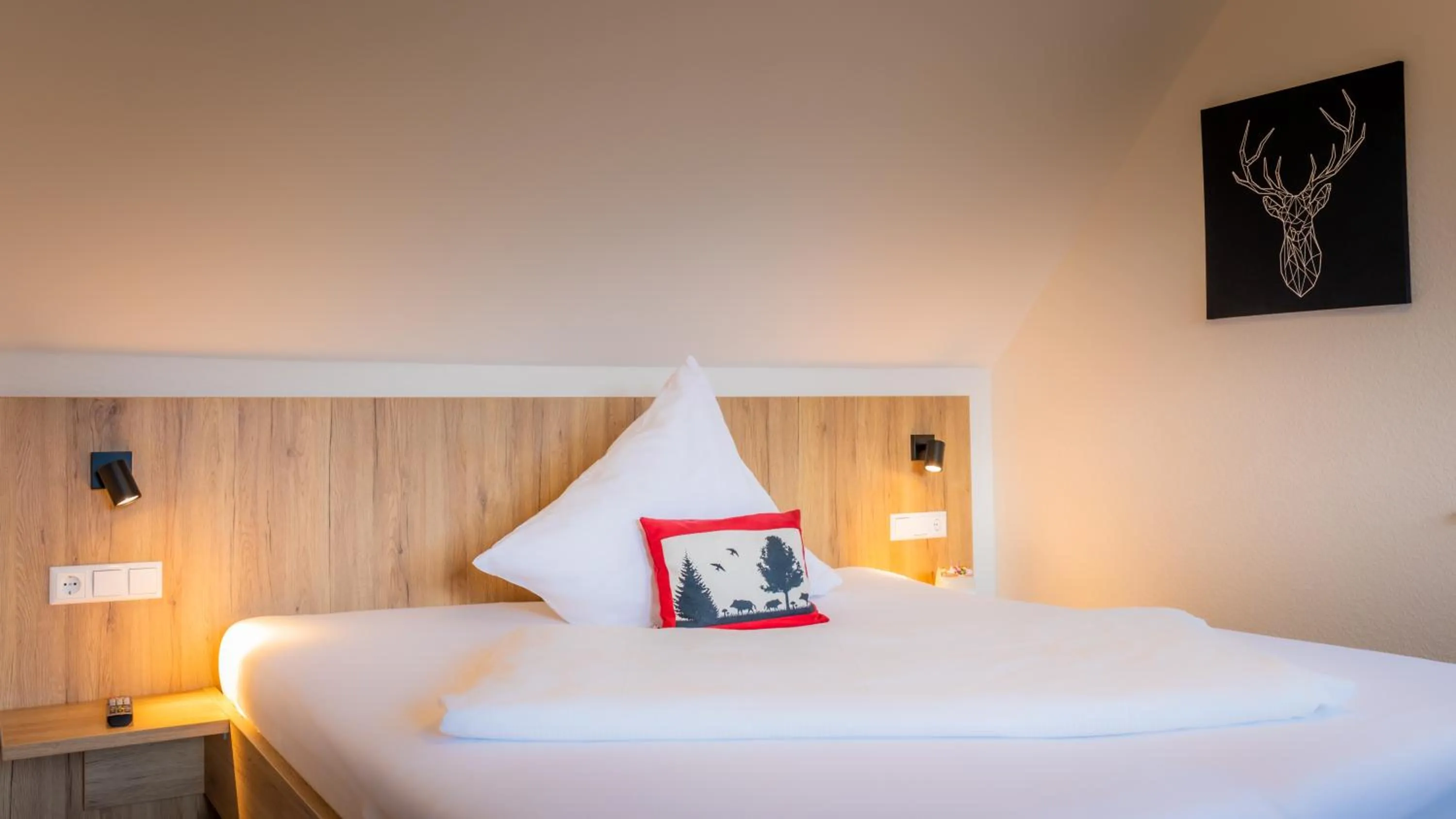 Bed in Gasthaus Hirschenstube & Gästehaus Gehri