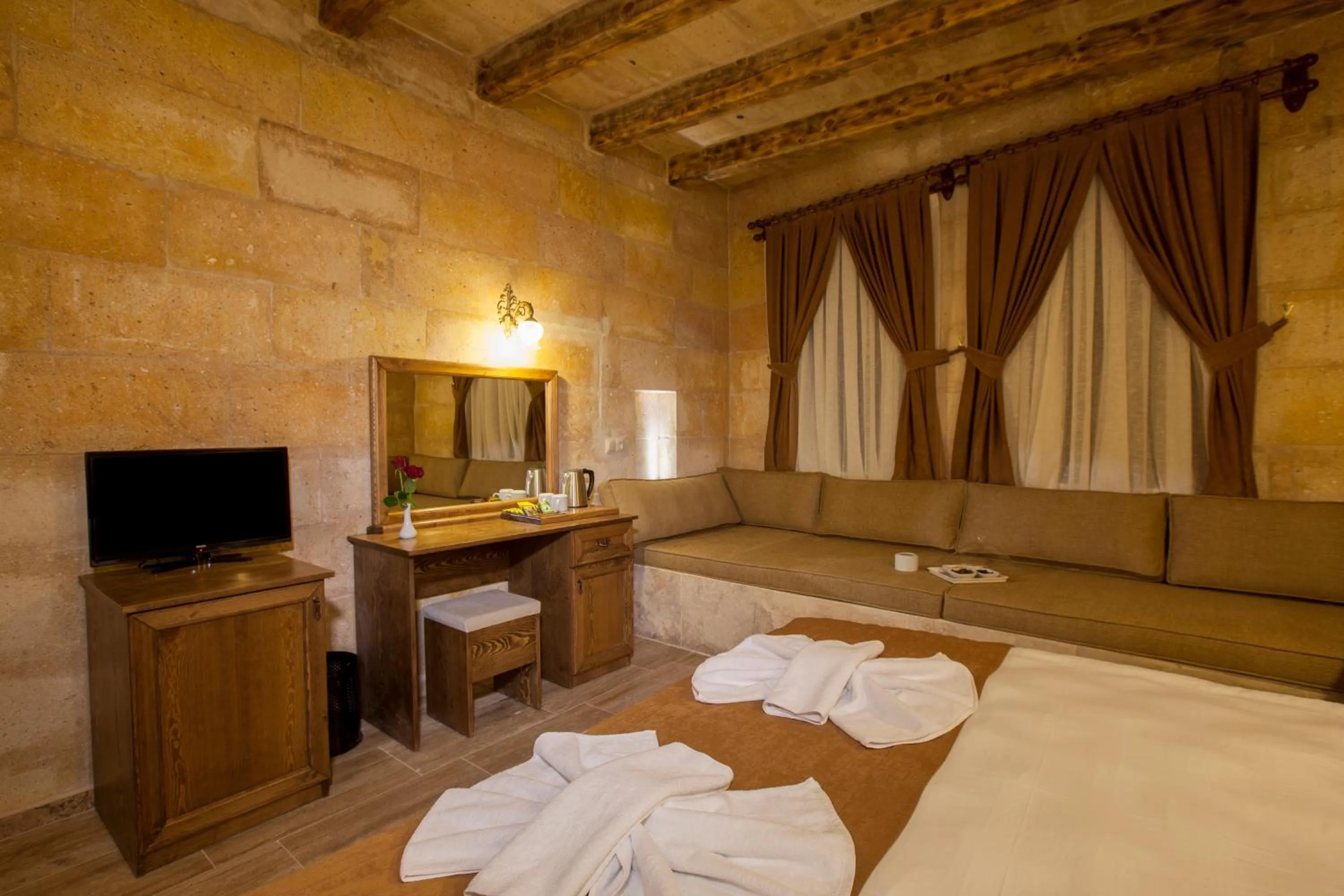 Photo of the whole room, Bed in Magic Cave House