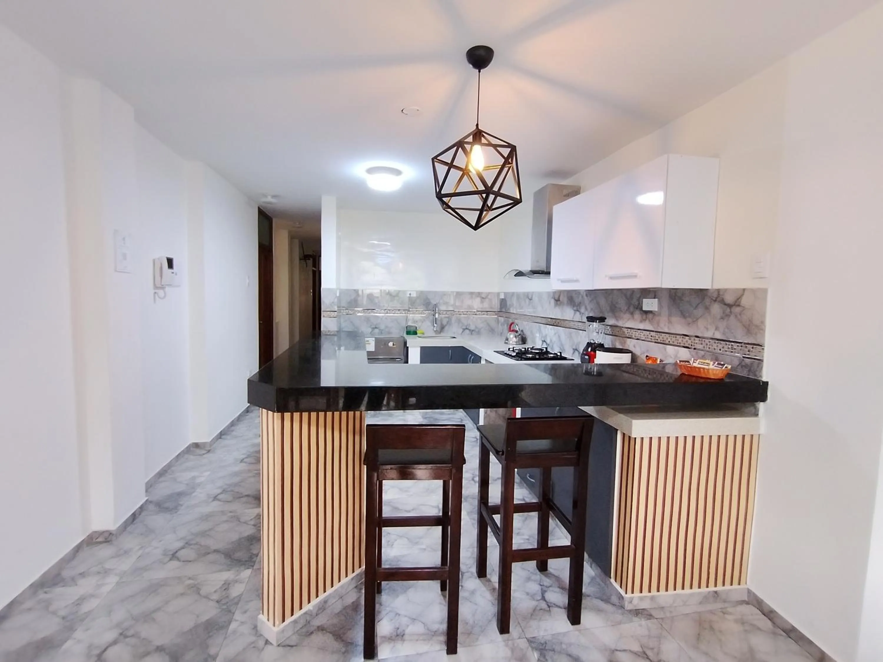 Kitchen or kitchenette in Apartamentos "APPART D'ELIETTE"