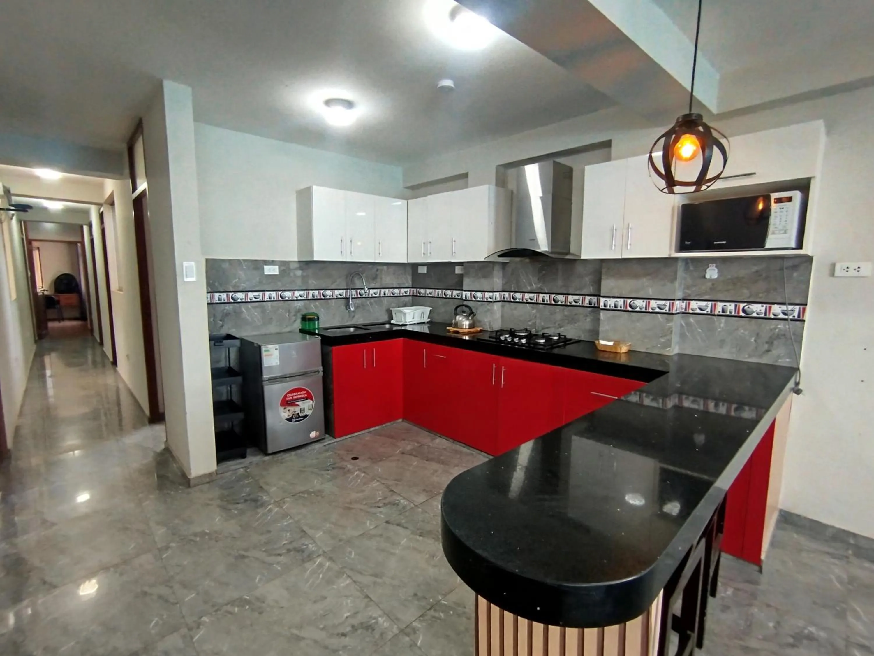 Kitchen or kitchenette in Apartamentos "APPART D'ELIETTE"