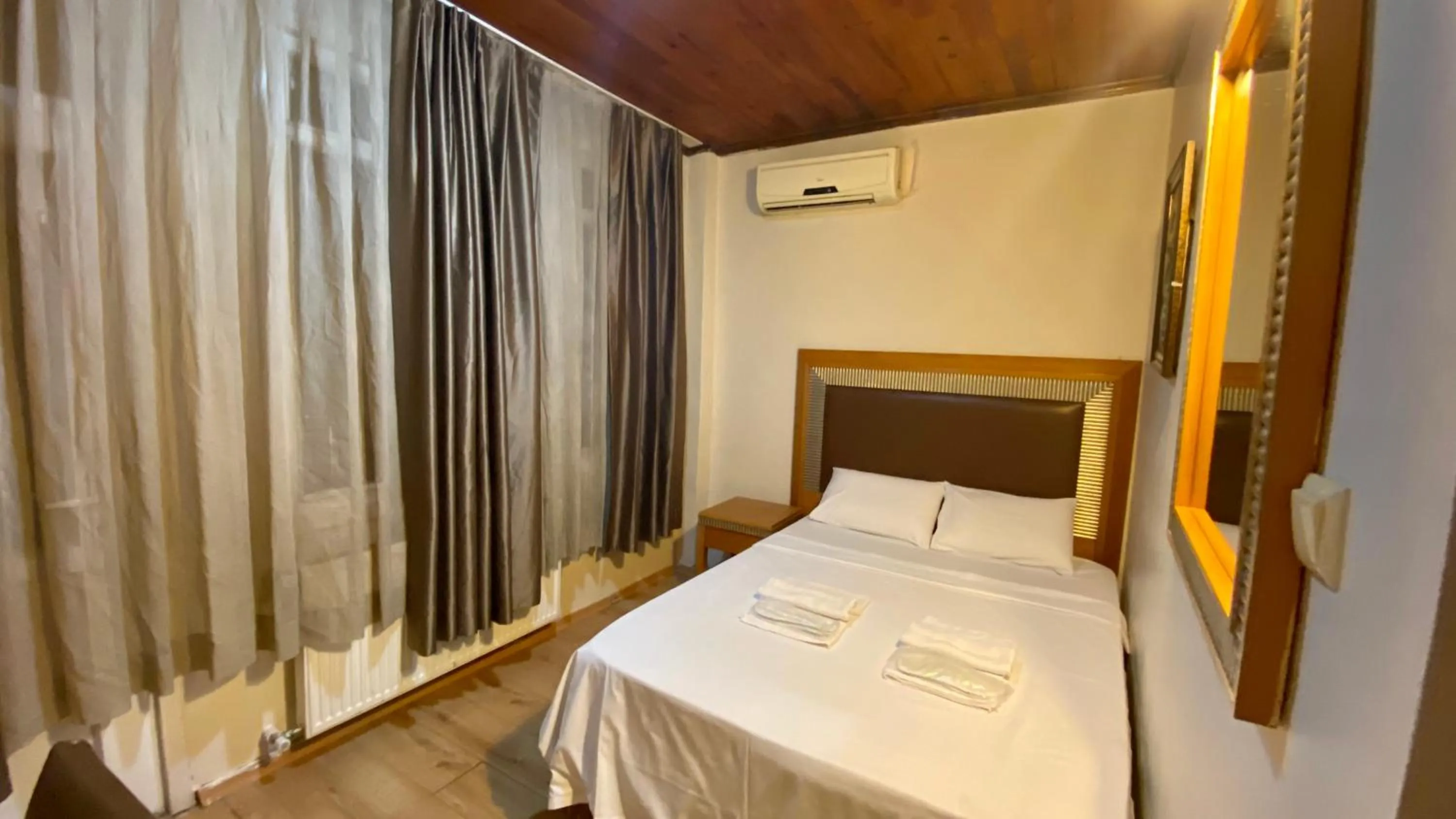 Bed in Herton Boutique Hotel