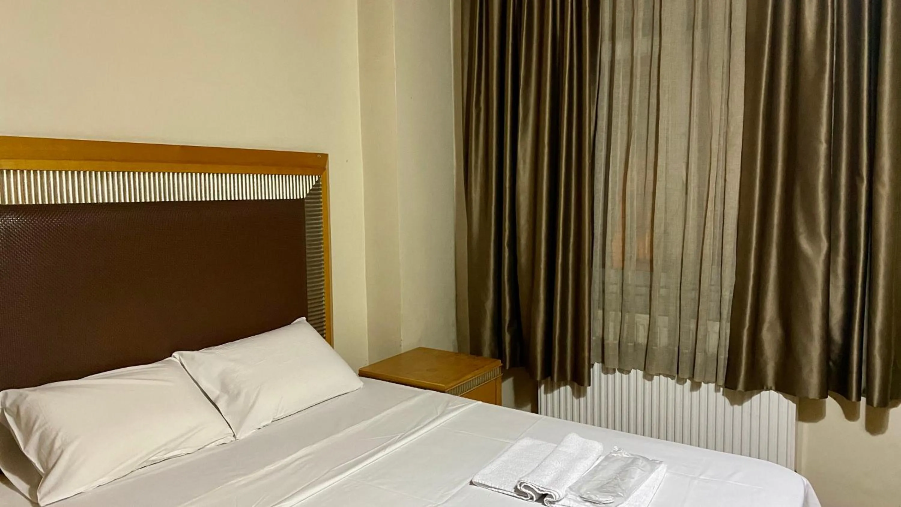 Bed in Herton Boutique Hotel