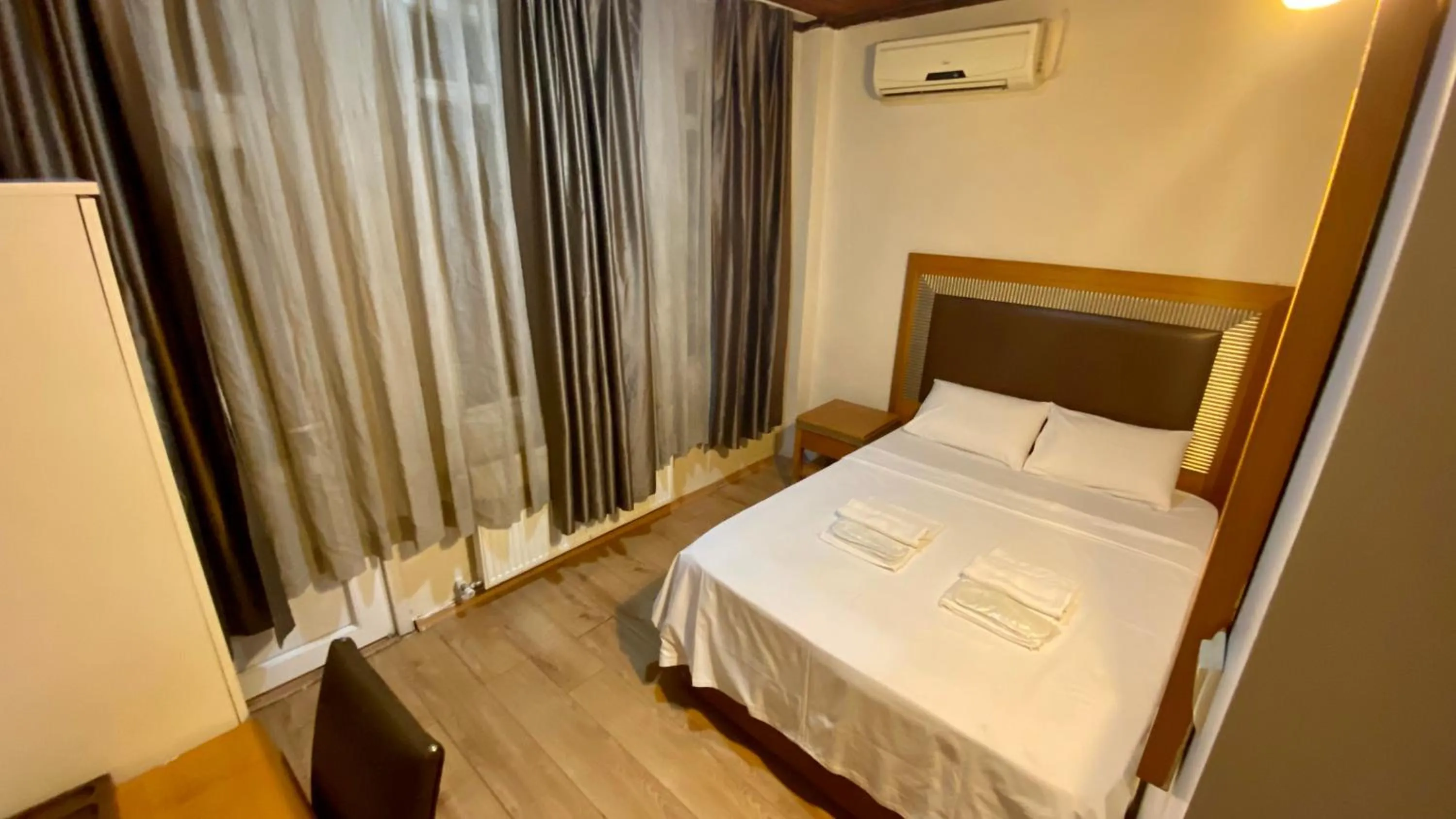 Bed in Herton Boutique Hotel