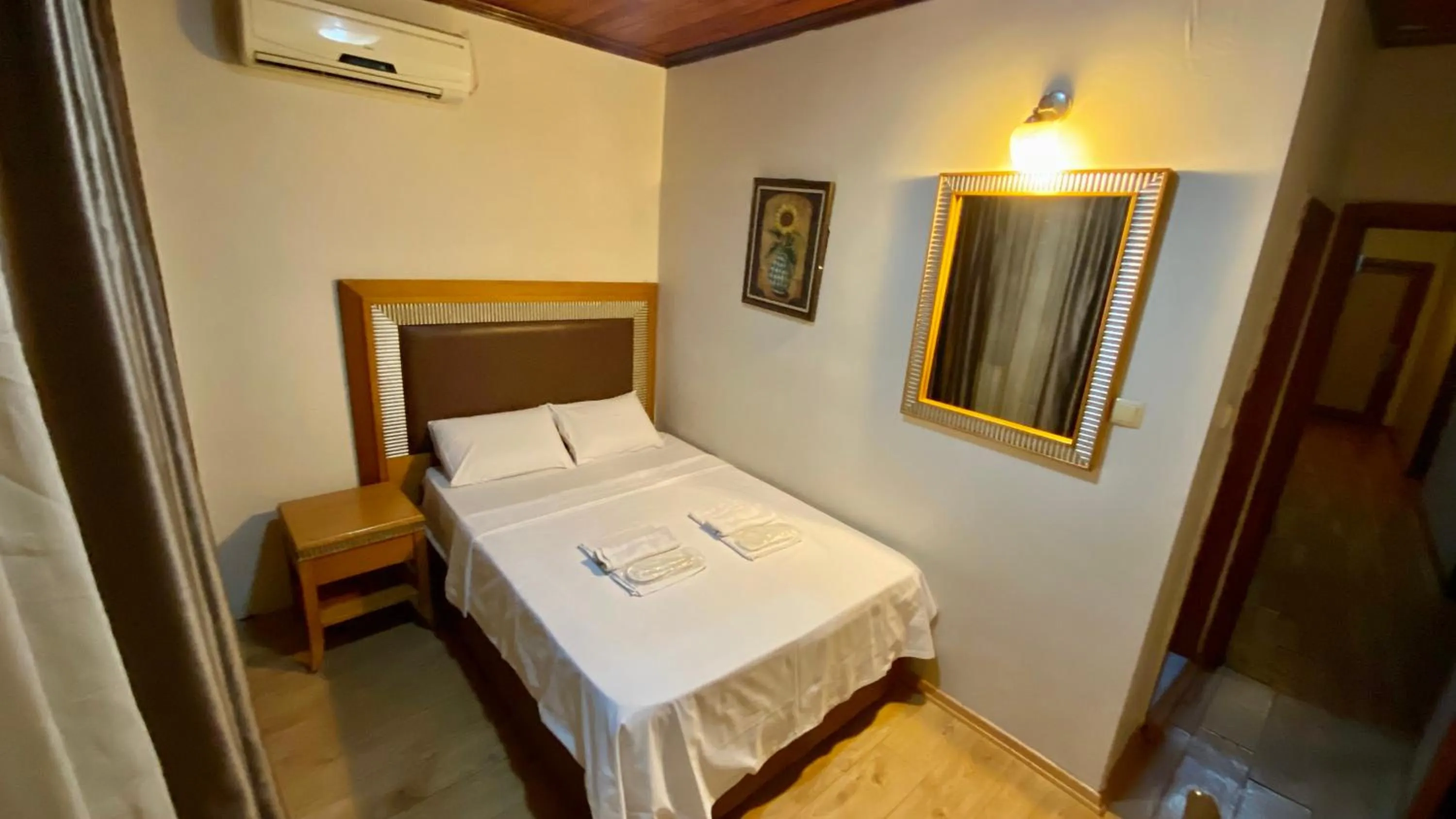 Bed in Herton Boutique Hotel