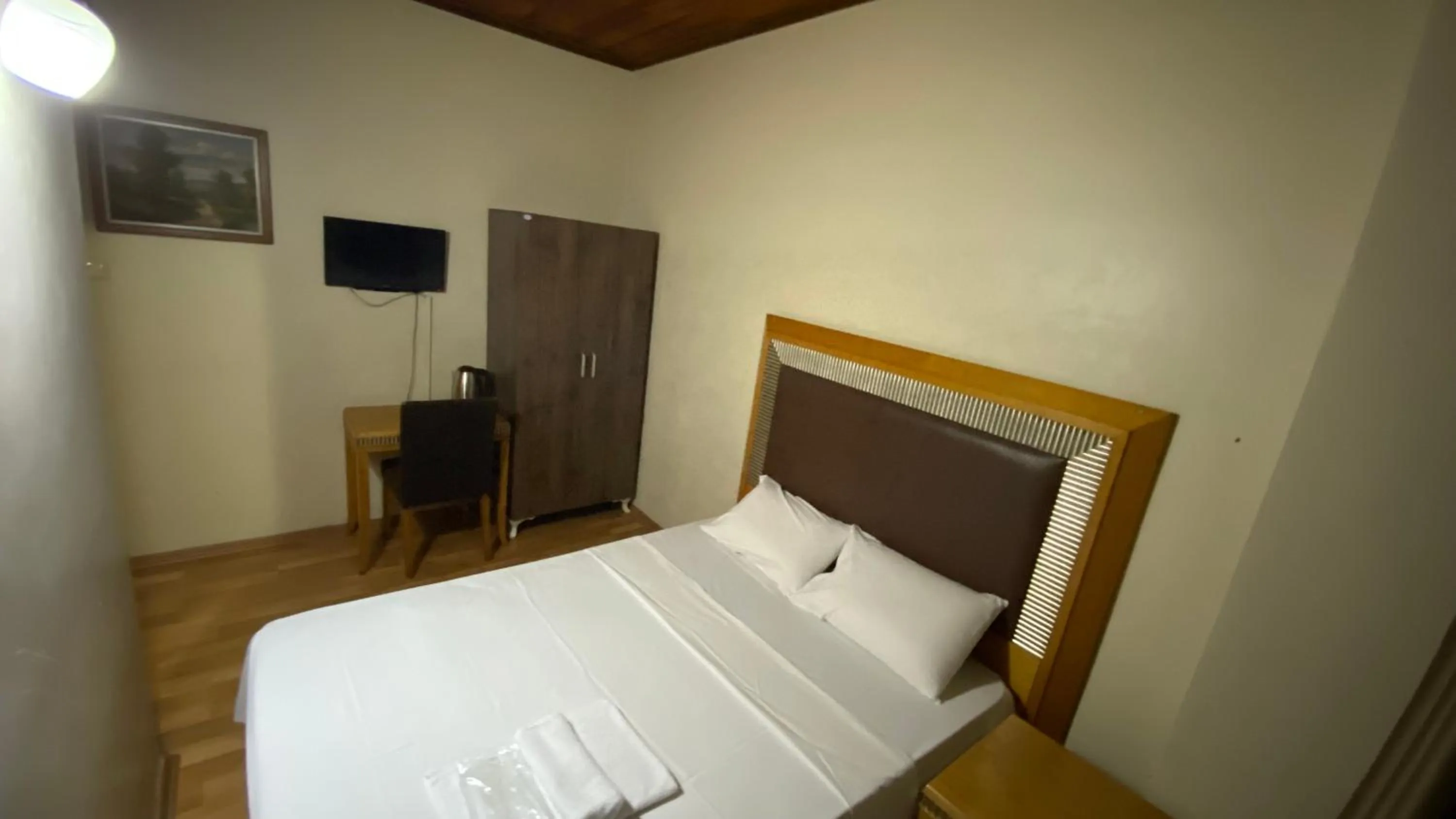 Bed in Herton Boutique Hotel