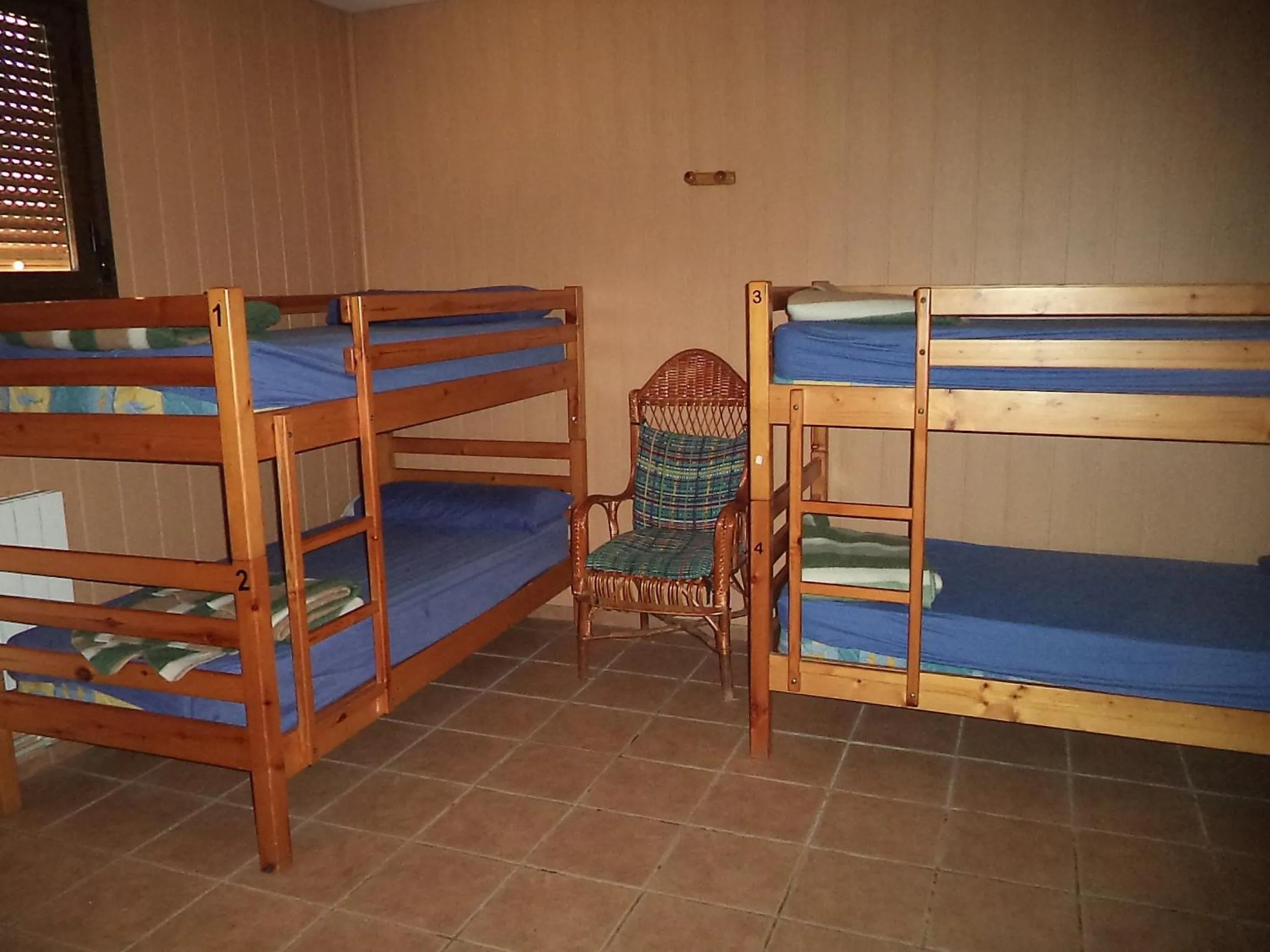 Decorative detail, Bed in Albergue de Peregrinos A Santiago