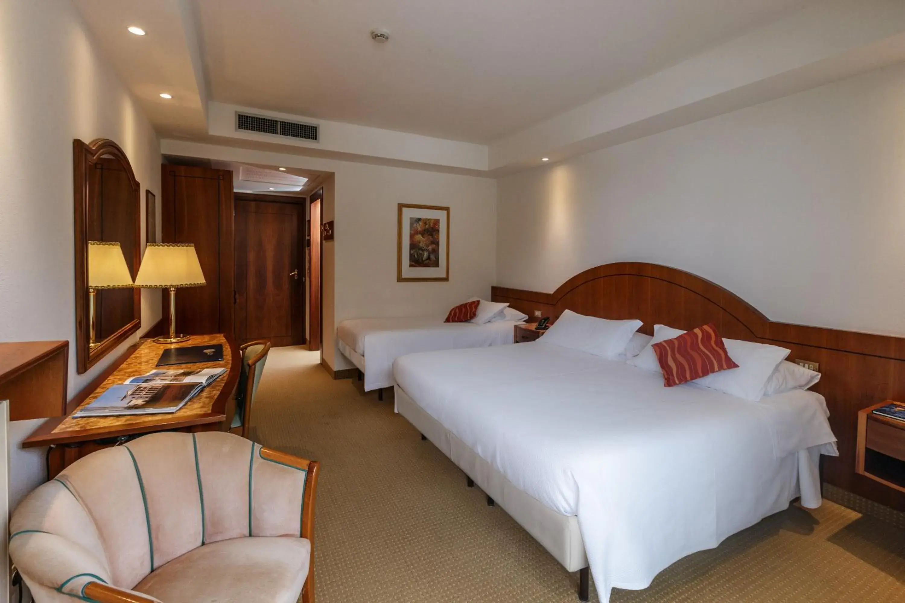 Classic Quadruple Room with Balcony in Hotel Terme Millepini Classic Quadruple Room with Balcony in Hotel Terme Millepini