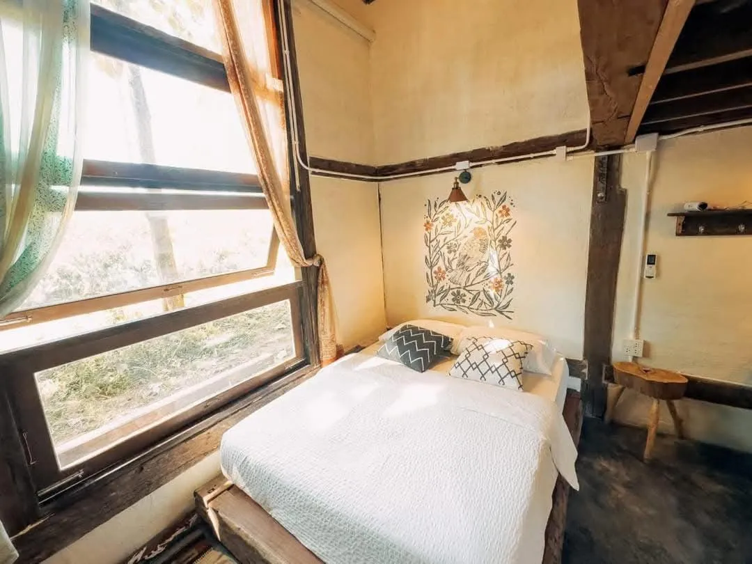 Bed in THE RIVER RUNS CHIANG KLANG